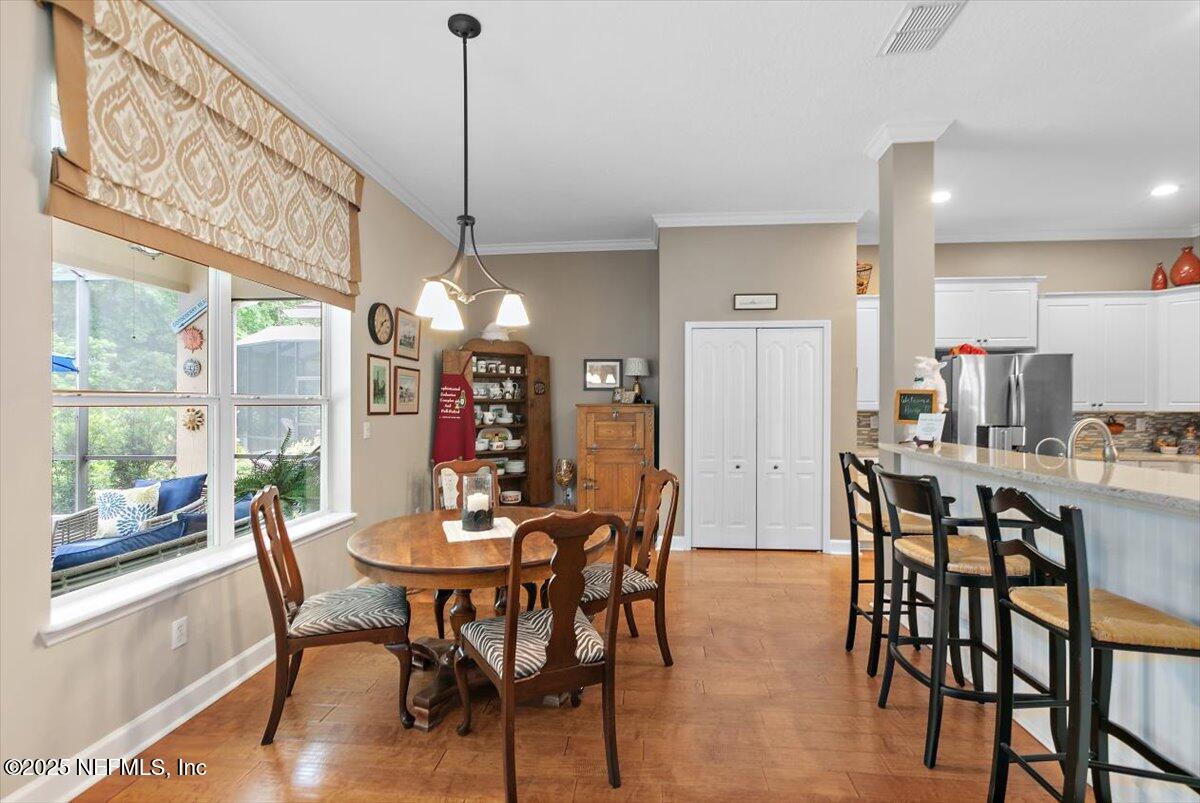 1400 Barrington Circle St. Augustine, FL 32092 - Photo 12 of 45 a view of a dining room with furniture window and outside view