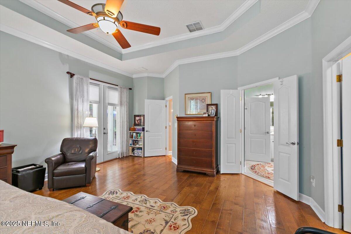 1400 Barrington Circle St. Augustine, FL 32092 - Photo 14 of 45 a living room with furniture a ceiling fan and a rug