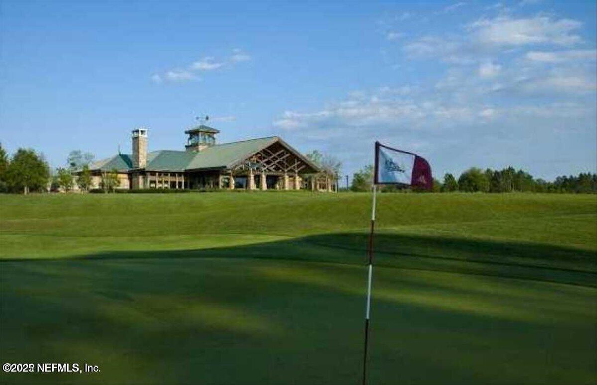 1400 Barrington Circle St. Augustine, FL 32092 - Photo 31 of 45 a view of a big house with a big yard
