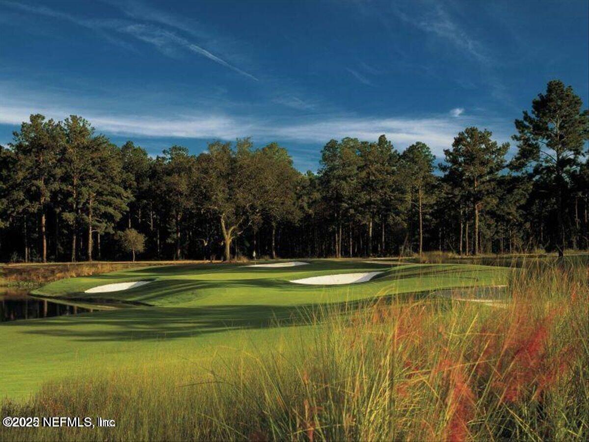 1400 Barrington Circle St. Augustine, FL 32092 - Photo 38 of 45 a view of a swimming pool with an outdoor space and seating area