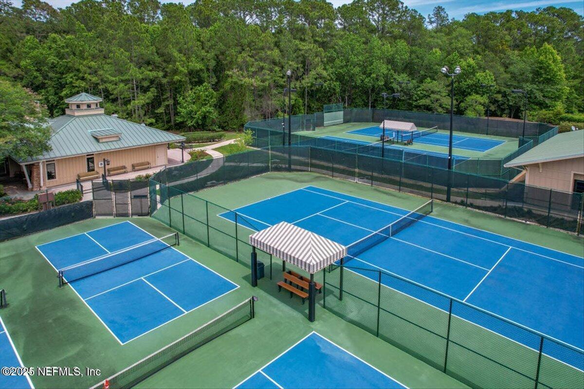 1400 Barrington Circle St. Augustine, FL 32092 - Photo 45 of 45 a view of a tennis ground with large trees