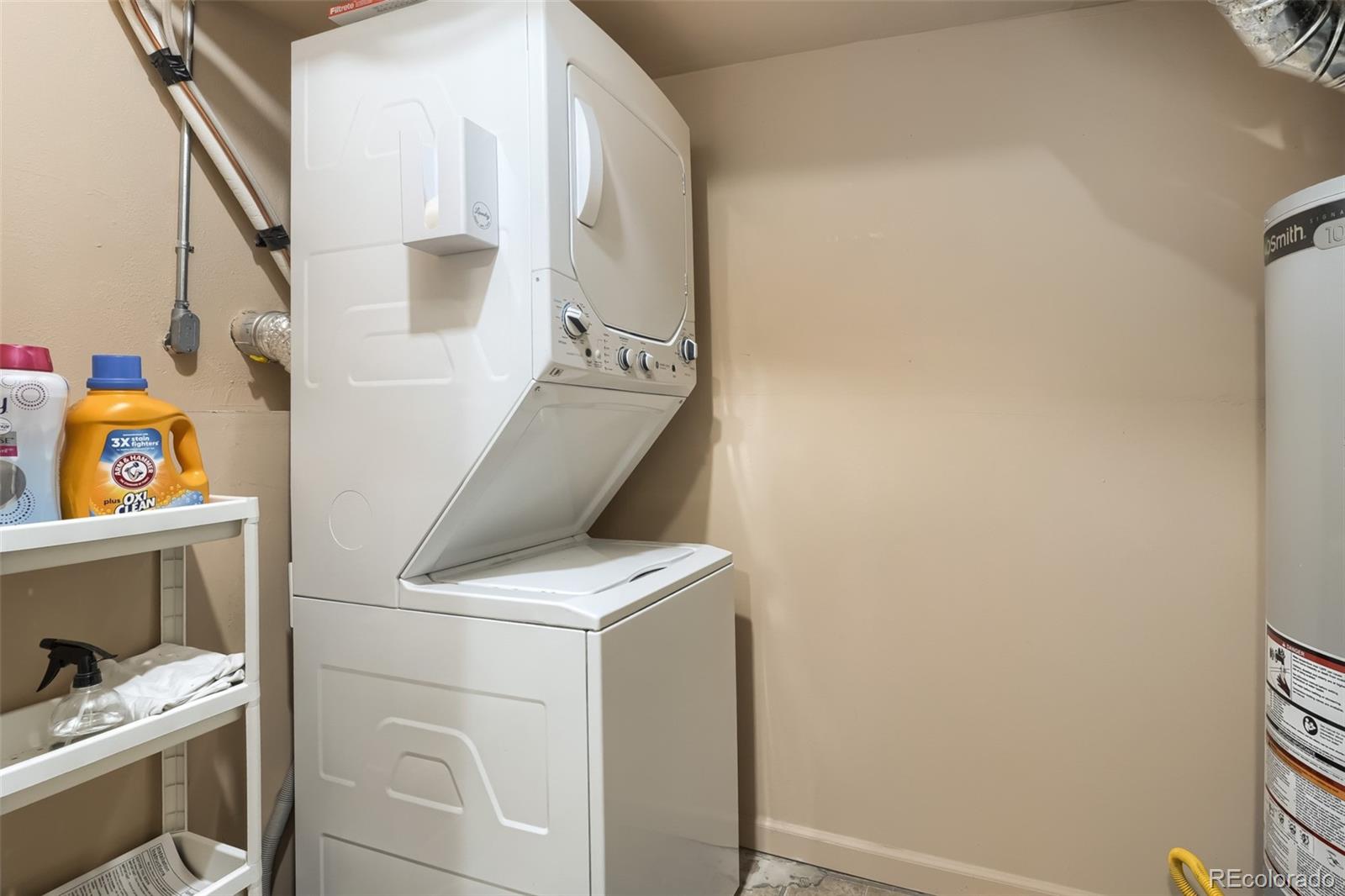 6551 South Albion Way Littleton, CO 80121 - Photo 25 of 37 a utility room with dryer and washer