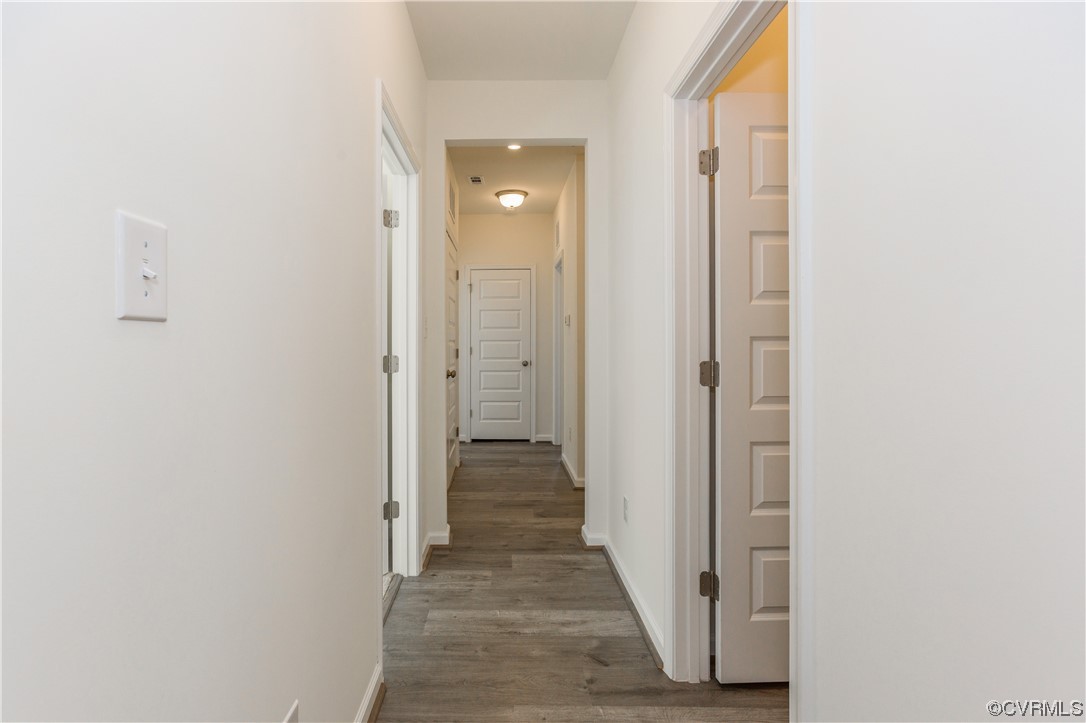 4119 Next Level Trace Midlothian, VA 23112 - Photo 18 of 50 a view of a hallway with wooden floor