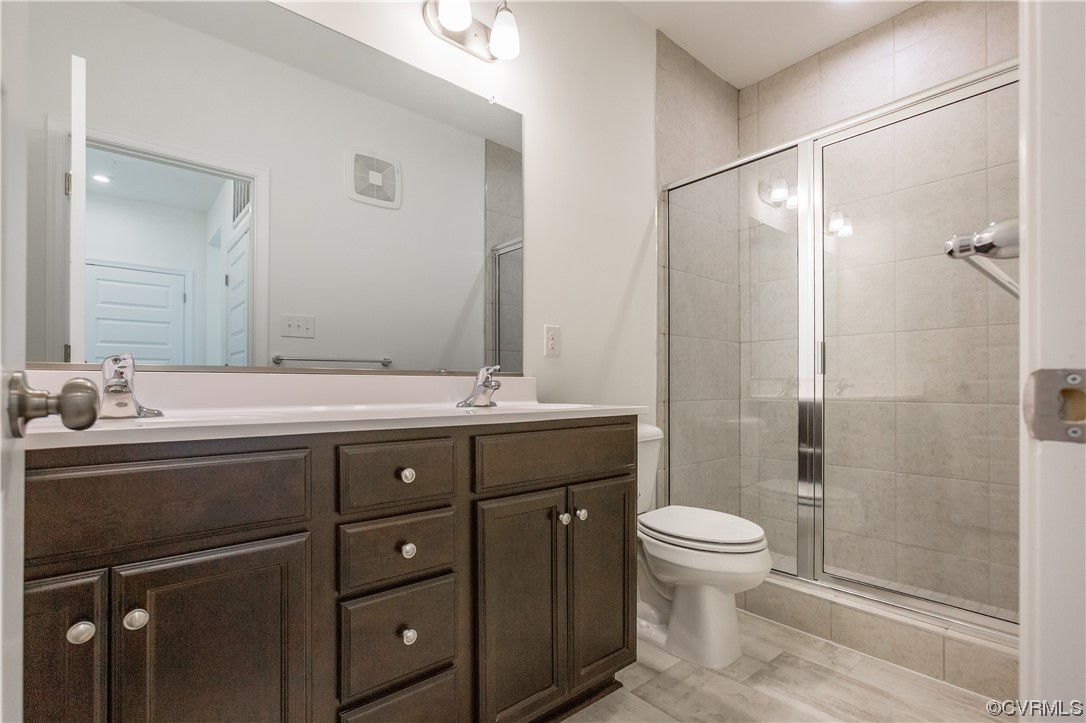 4119 Next Level Trace Midlothian, VA 23112 - Photo 29 of 50 a bathroom with a sink toilet and shower