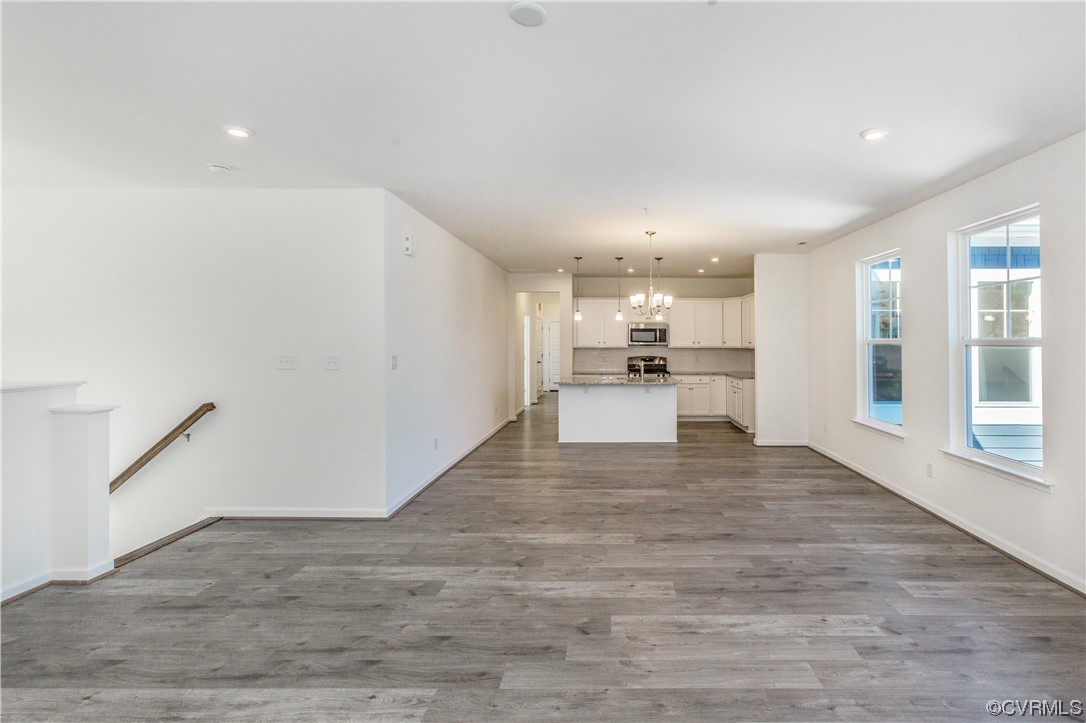 4119 Next Level Trace Midlothian, VA 23112 - Photo 8 of 50 a view of a kitchen with a sink and a refrigerator