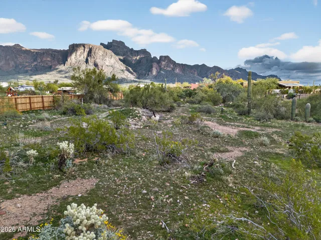 a view of a building in a field