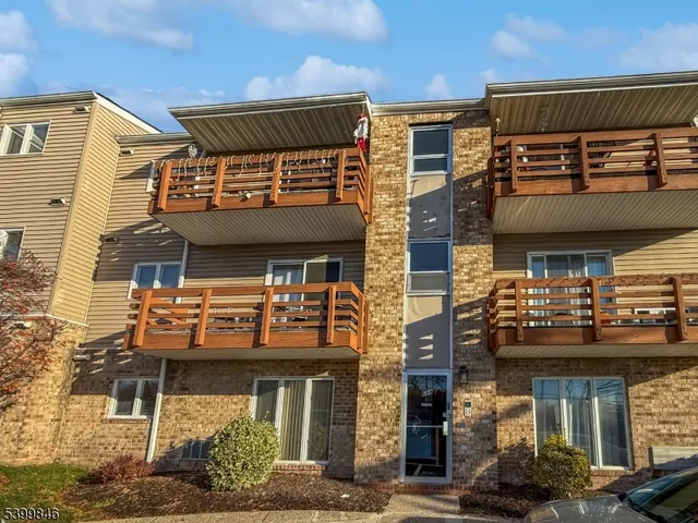 a view of a building with retail shops