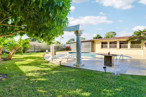 a view of a house with a park