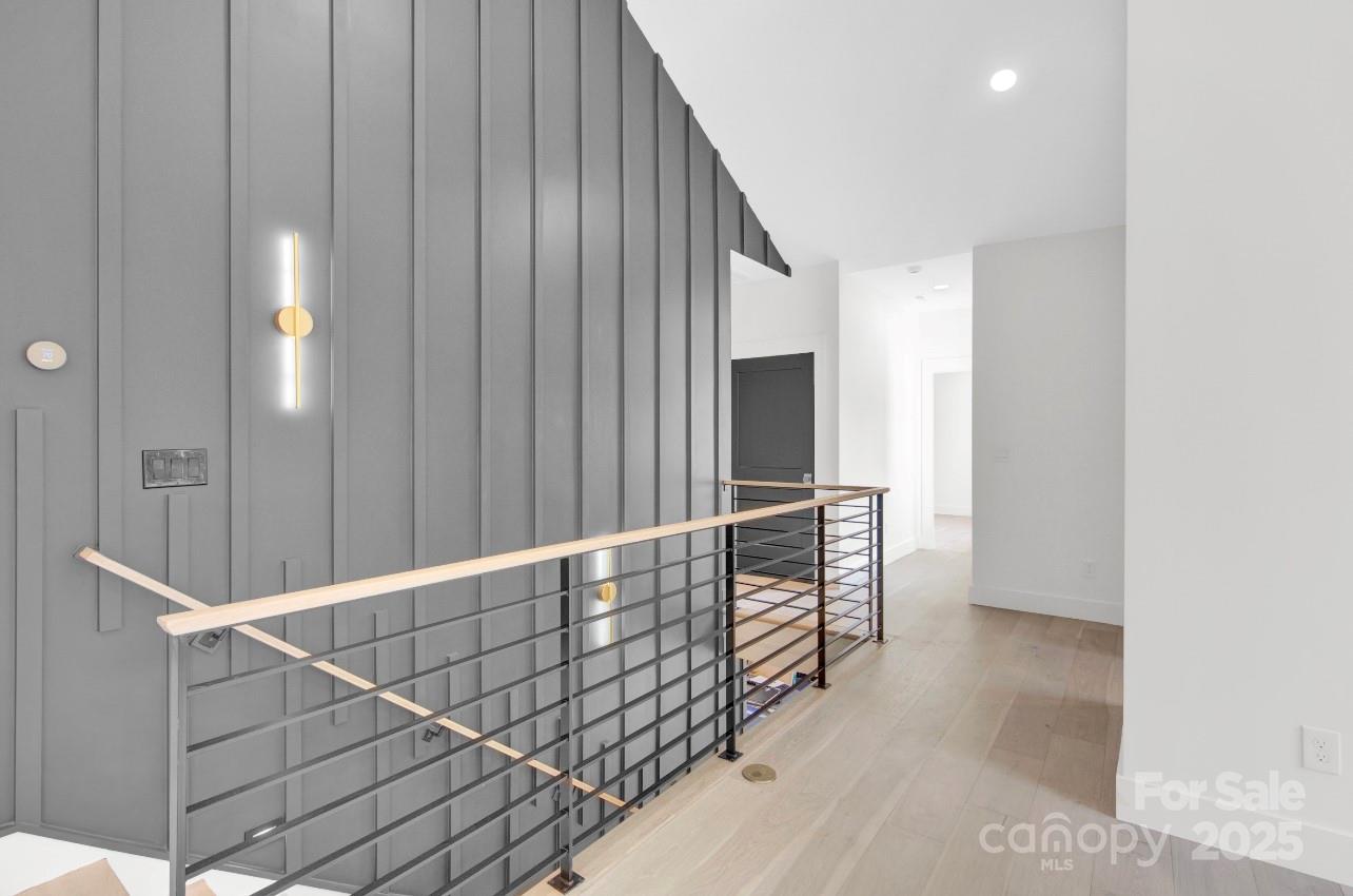 2 Antioch Church Road, Unit 1 Weddington, NC 28104 - Photo 6 of 10 a view of staircase with railing and white walls