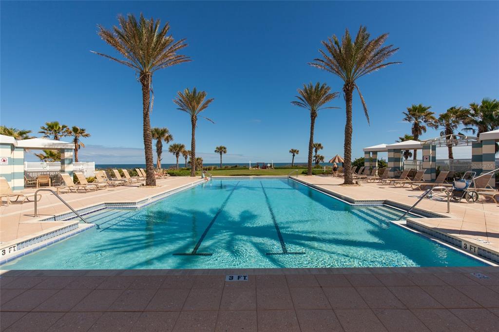 6 Cinnamon Beach Way Palm Coast, FL 32137 - Photo 23 of 58 a view of swimming pool with outdoor seating and a terrace