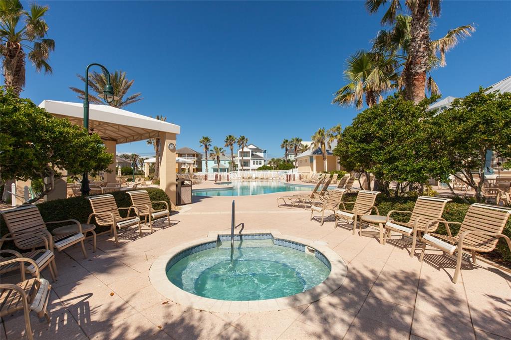 6 Cinnamon Beach Way Palm Coast, FL 32137 - Photo 43 of 58 a swimming pool with outdoor seating and yard