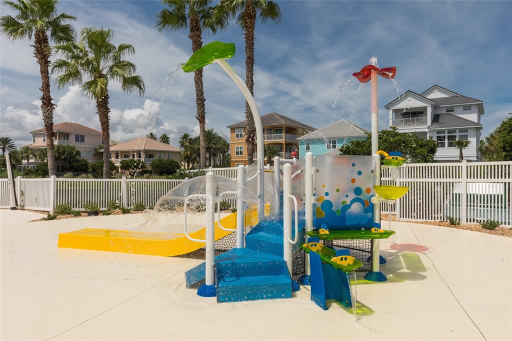 6 Cinnamon Beach Way Palm Coast, FL 32137 - Photo 44 of 58 a view of a swimming pool with a lounge chair