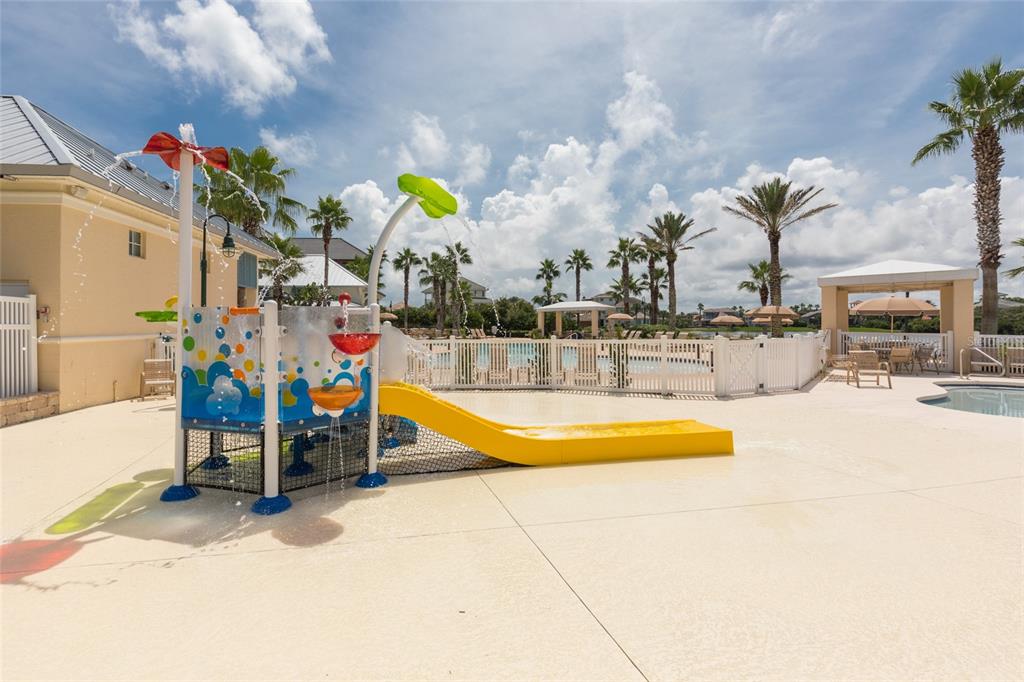 6 Cinnamon Beach Way Palm Coast, FL 32137 - Photo 45 of 58 a view of a swimming pool with a patio