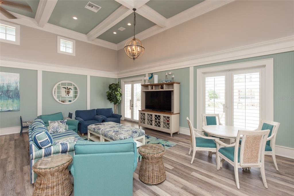 6 Cinnamon Beach Way Palm Coast, FL 32137 - Photo 51 of 58 a living room with furniture and a flat screen tv