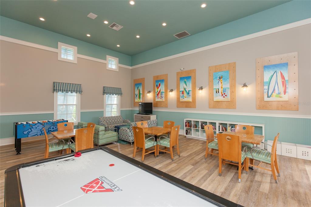 6 Cinnamon Beach Way Palm Coast, FL 32137 - Photo 52 of 58 a living room with furniture kitchen view and a large window