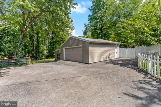 a view of garage and yard