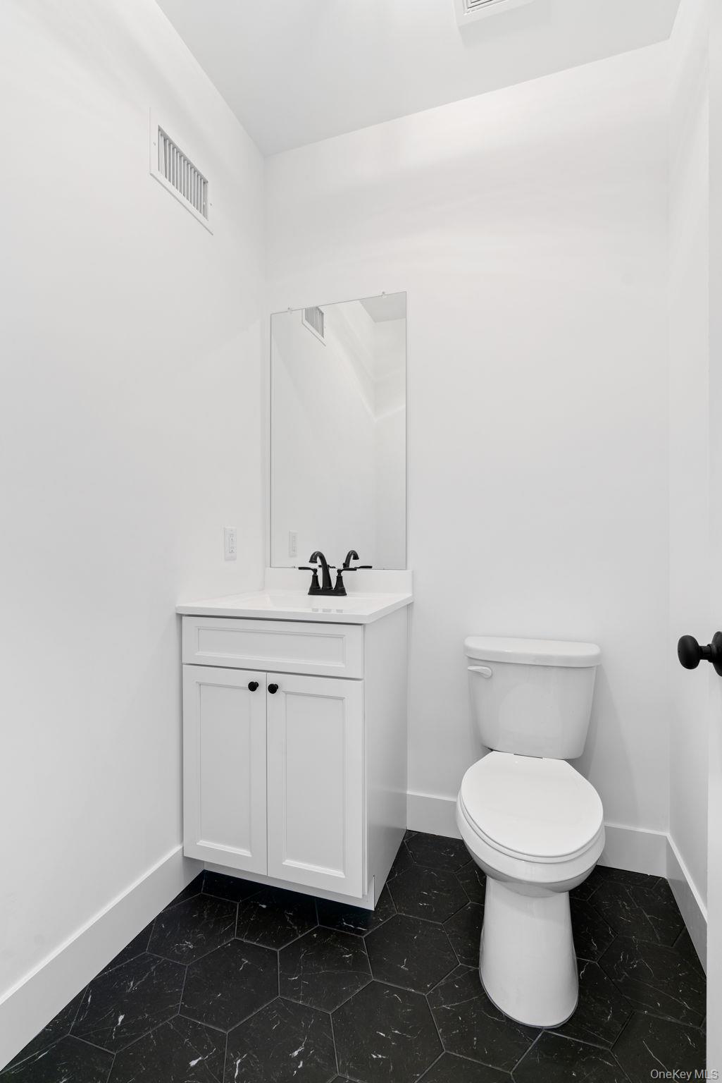 13 Harrier Ridge Drive Wallkill, NY 12589 - Photo 12 of 40 Bathroom featuring vanity and baseboards