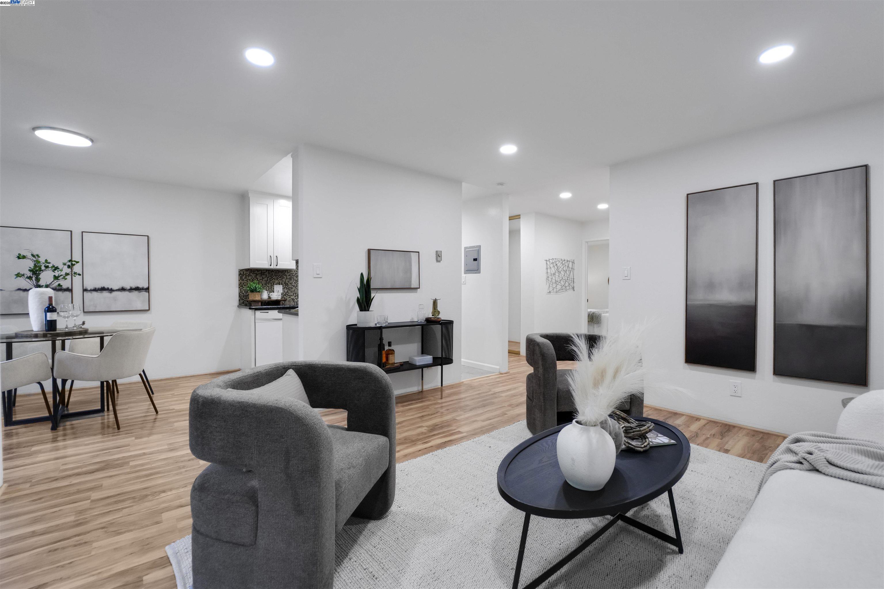 505 Cypress Point Drive, Unit 140 Mountain View, CA 94043 - Photo 33 of 60 a living room with furniture and a wooden floor