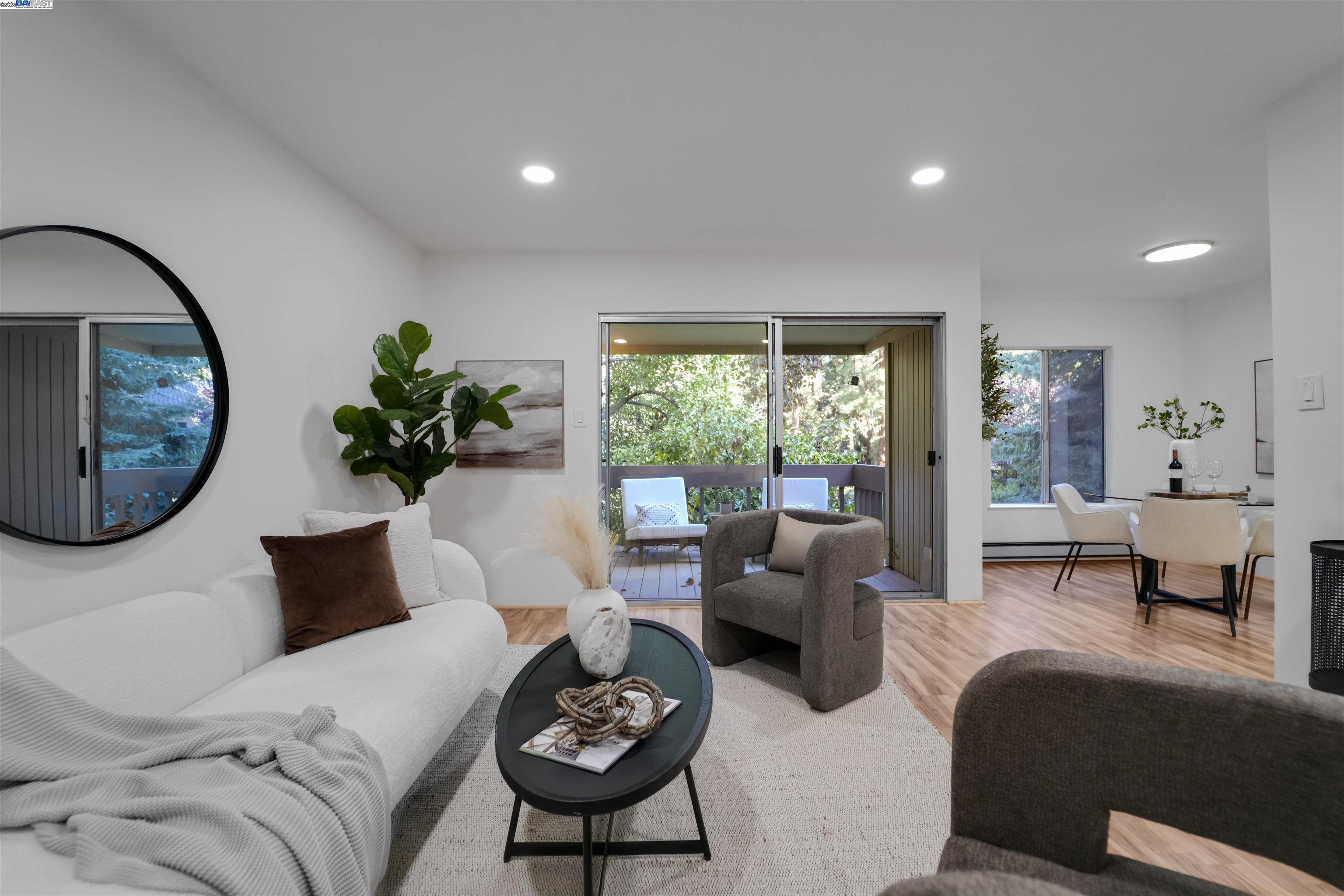 505 Cypress Point Drive, Unit 140 Mountain View, CA 94043 - Photo 34 of 60 a living room with furniture and a window