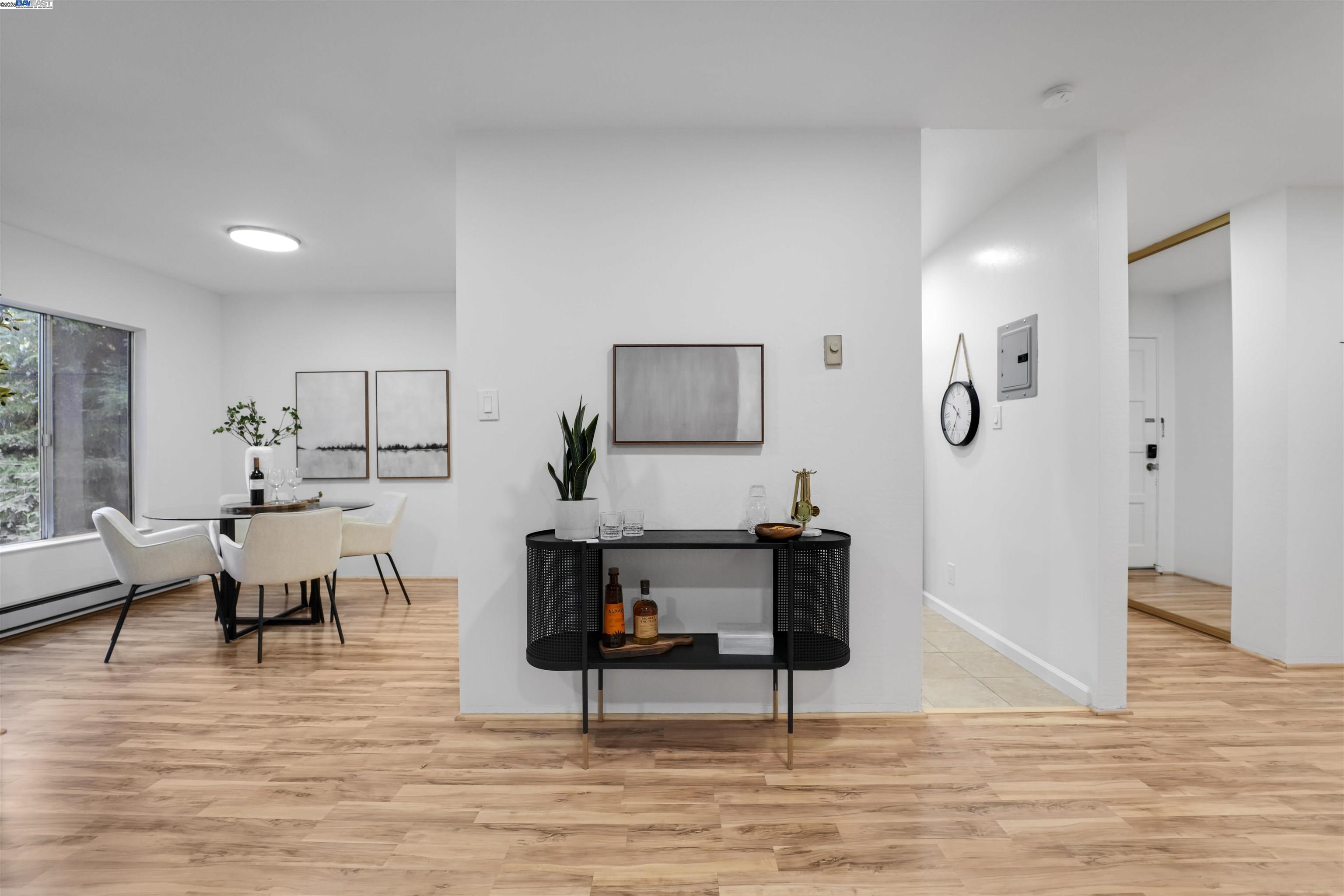 505 Cypress Point Drive, Unit 140 Mountain View, CA 94043 - Photo 37 of 60 a living room with furniture and a wooden floor