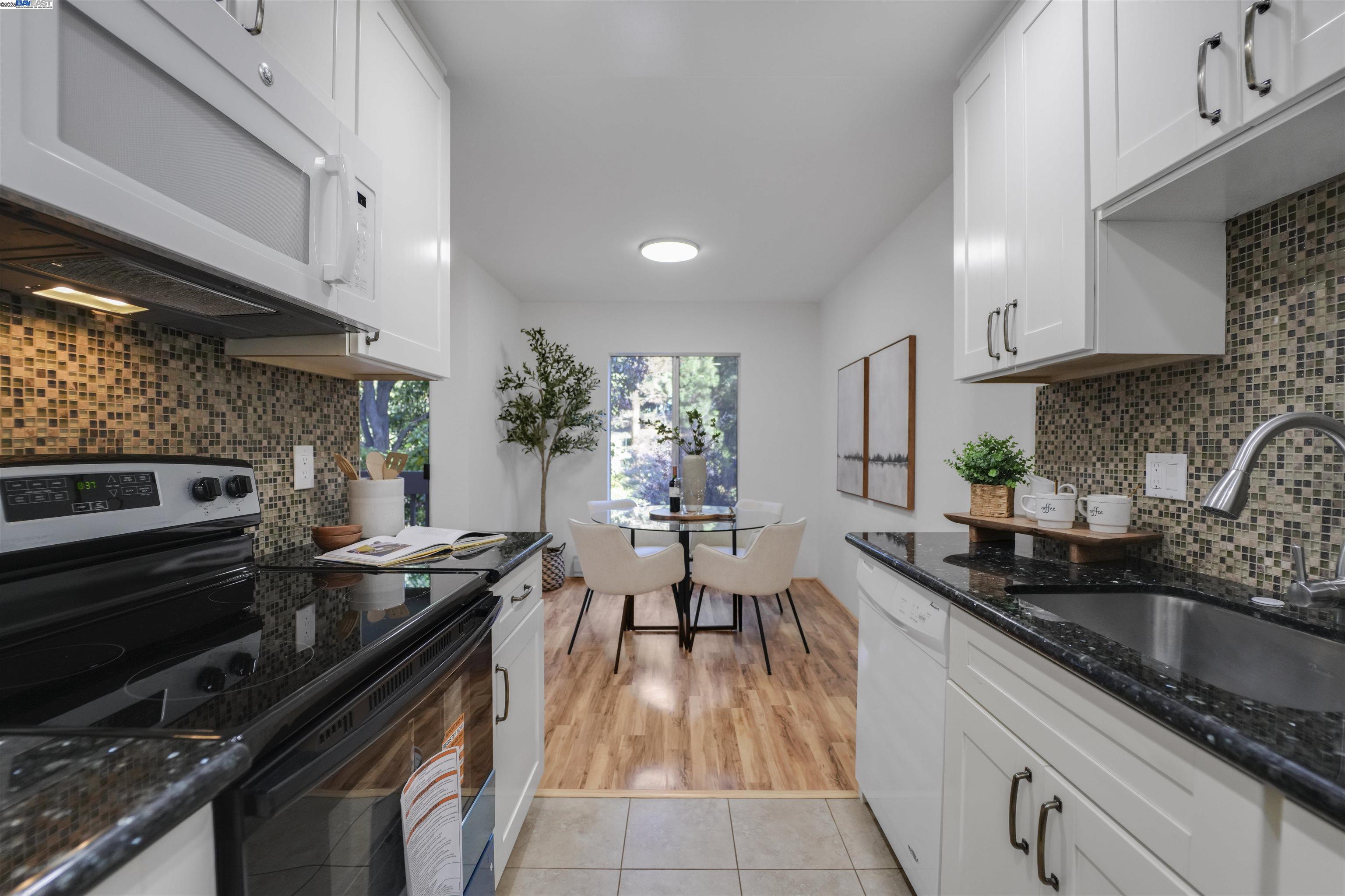 505 Cypress Point Drive, Unit 140 Mountain View, CA 94043 - Photo 38 of 60 a kitchen with granite countertop lots of counter top space