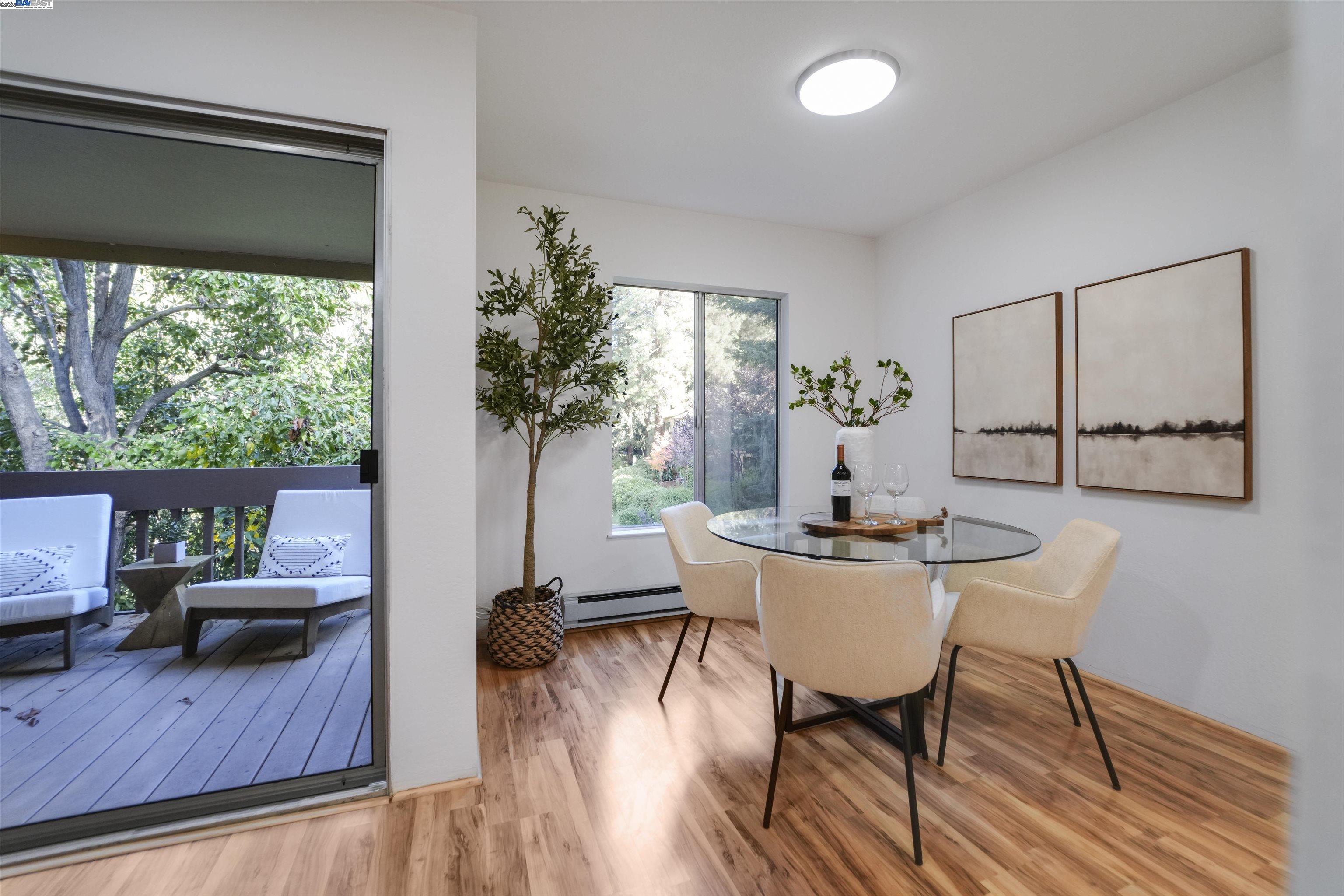 505 Cypress Point Drive, Unit 140 Mountain View, CA 94043 - Photo 45 of 60 a view of a livingroom with furniture window and wooden floor