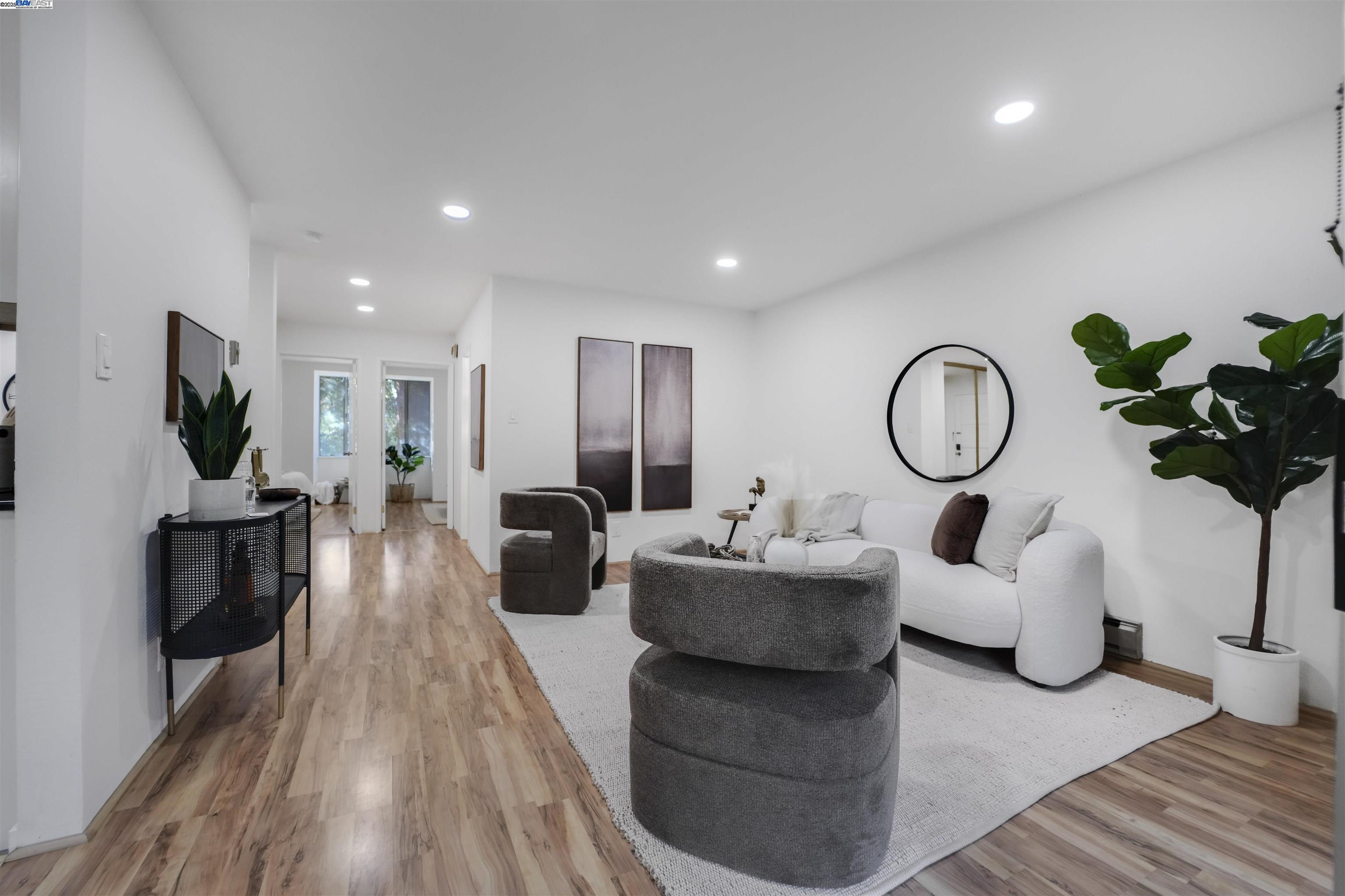 505 Cypress Point Drive, Unit 140 Mountain View, CA 94043 - Photo 47 of 60 a living room with fireplace furniture and a flat screen tv