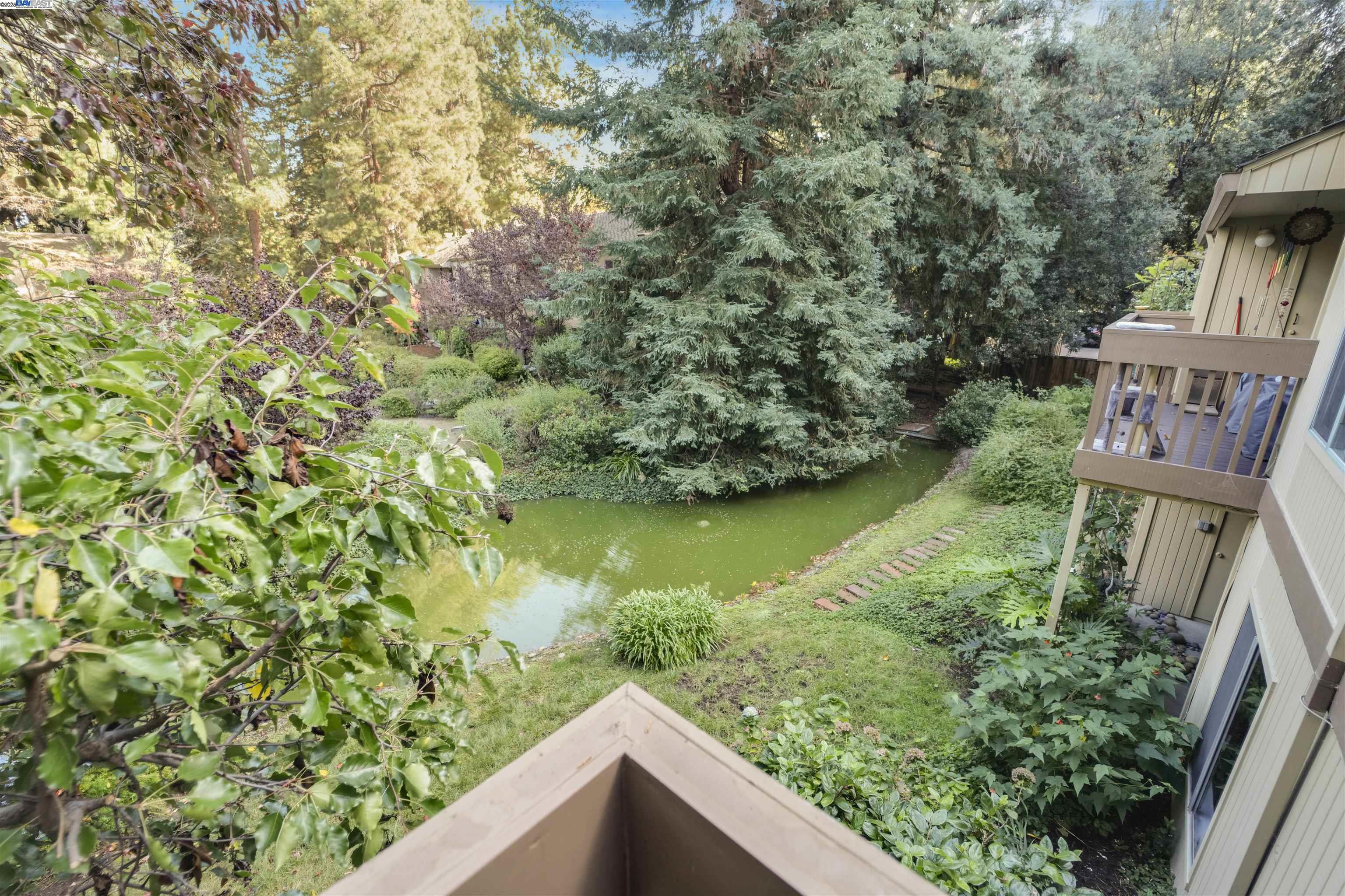 505 Cypress Point Drive, Unit 140 Mountain View, CA 94043 - Photo 49 of 60 a view of a garden from a balcony