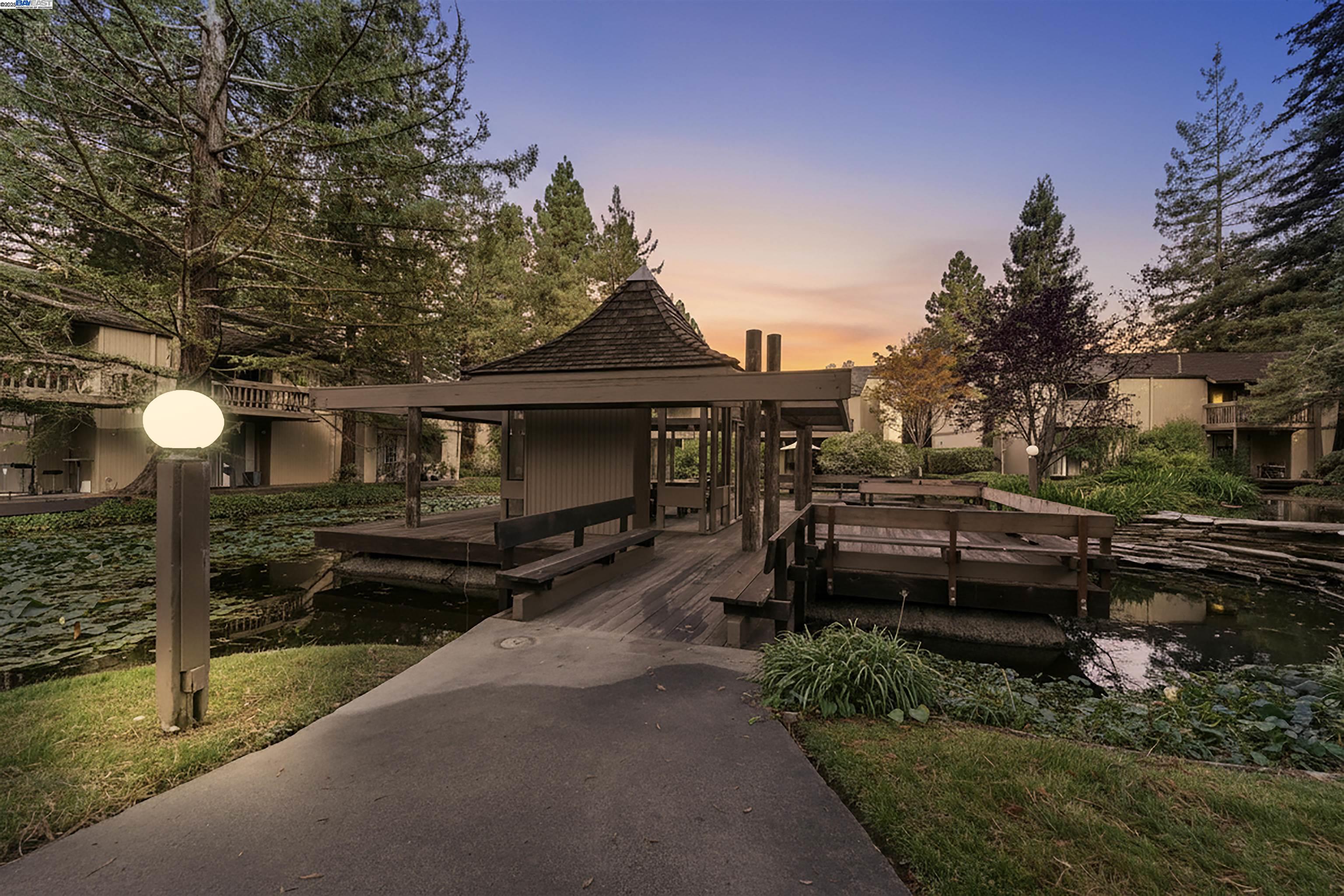 505 Cypress Point Drive, Unit 140 Mountain View, CA 94043 - Photo 5 of 60 a front view of a house with a yard