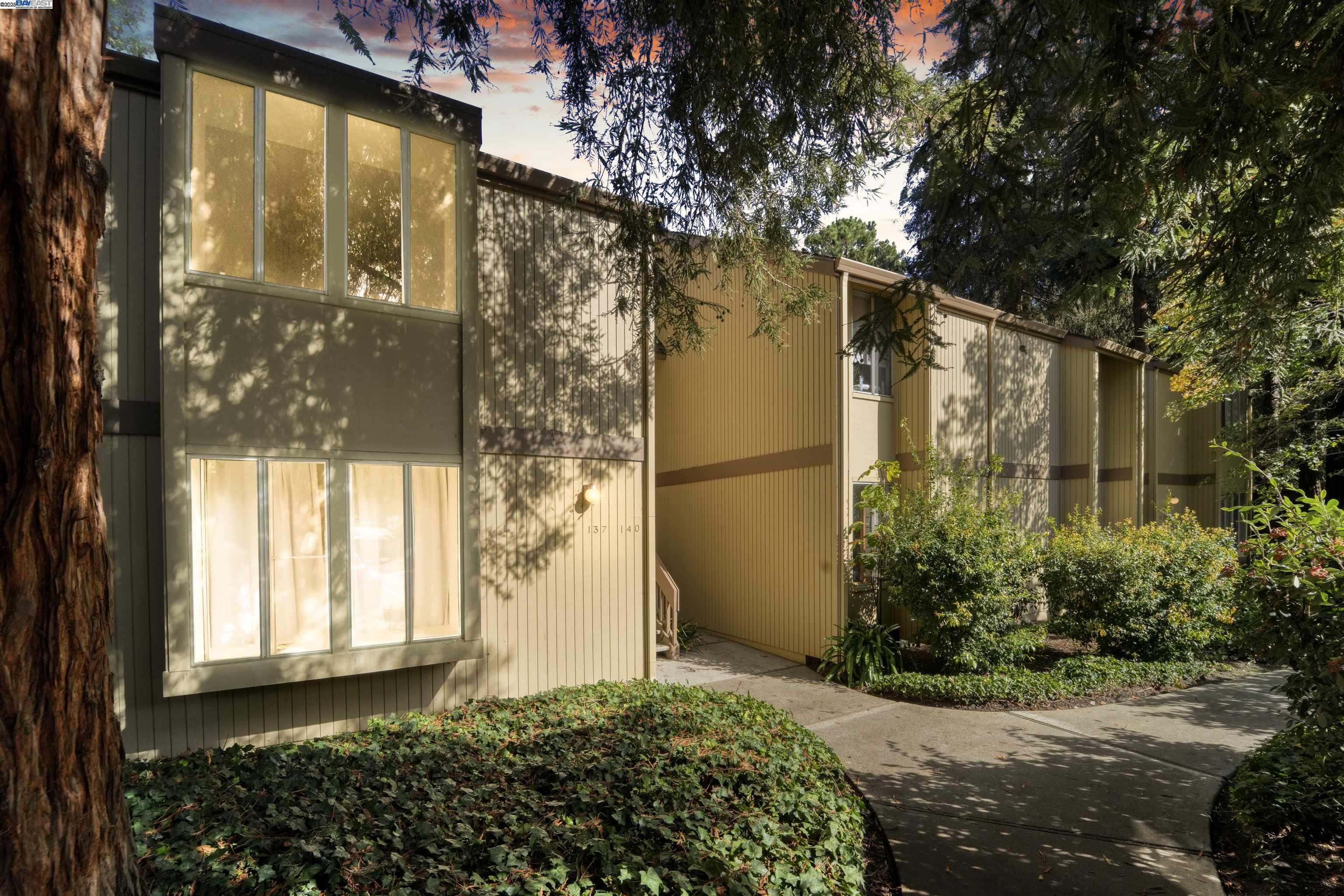 505 Cypress Point Drive, Unit 140 Mountain View, CA 94043 - Photo 6 of 60 a view of a house with a large tree