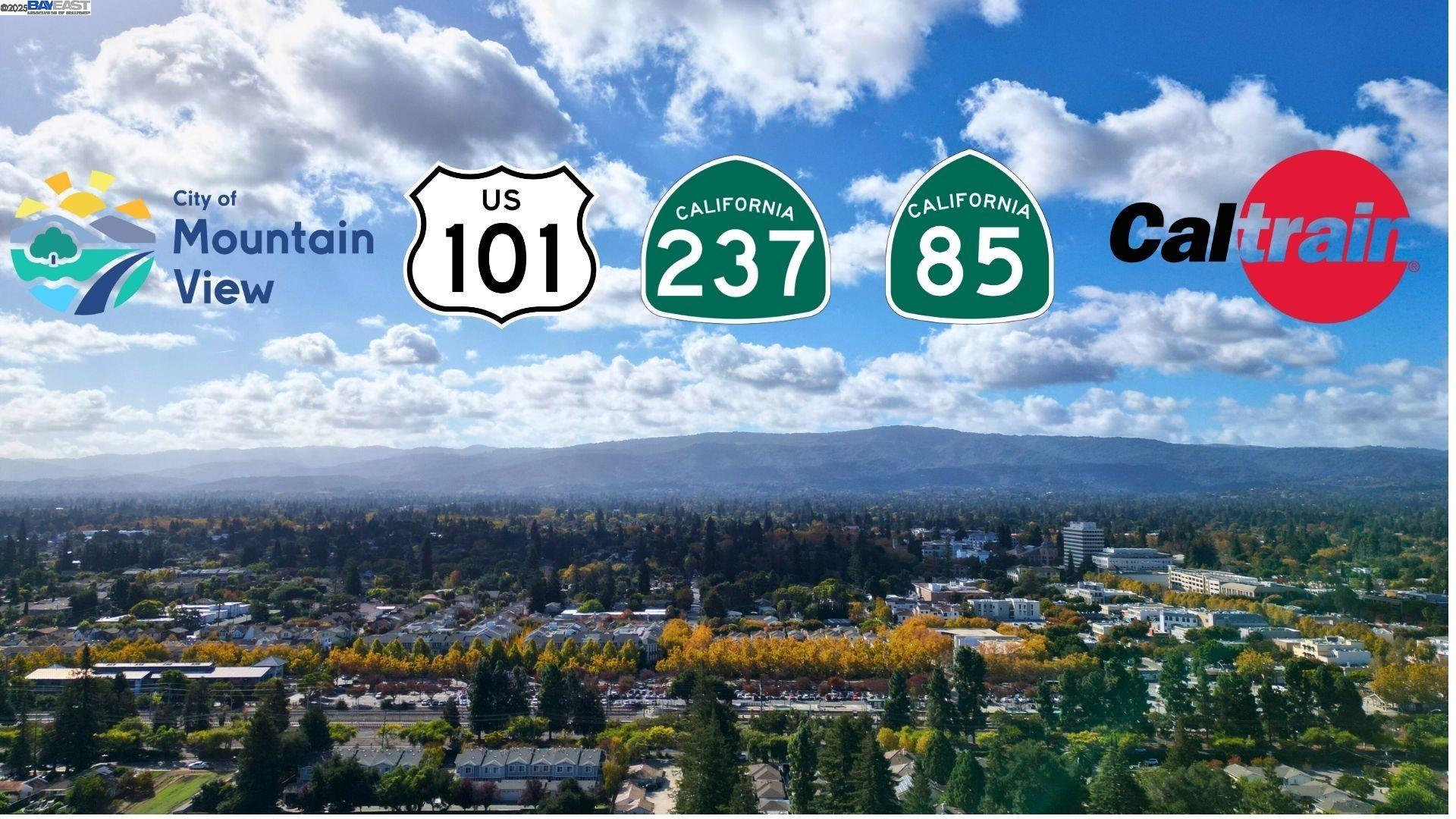 505 Cypress Point Drive, Unit 140 Mountain View, CA 94043 - Photo 9 of 60 an aerial view of a residential apartment building and a street sign