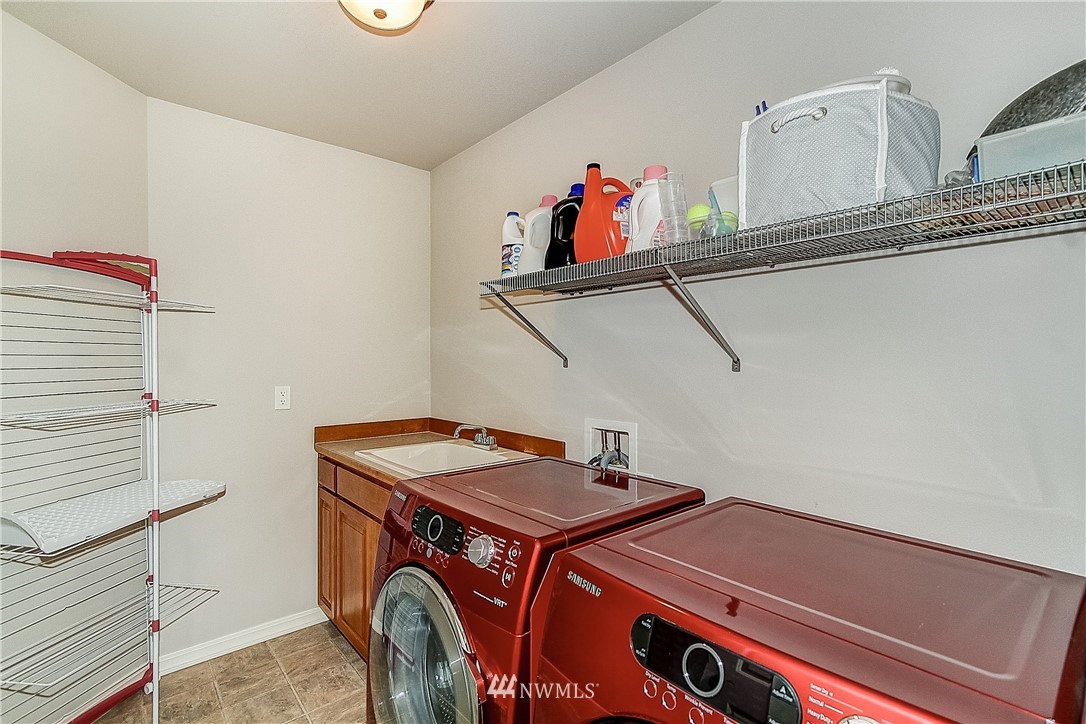 4004 215th Street Southeast Bothell, WA 98021 - Photo 24 of 25 a utility room with dryer and washer