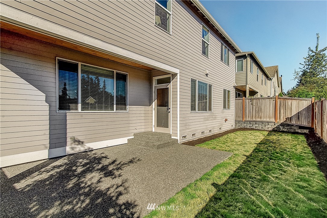 4004 215th Street Southeast Bothell, WA 98021 - Photo 25 of 25 a front view of a house with a yard