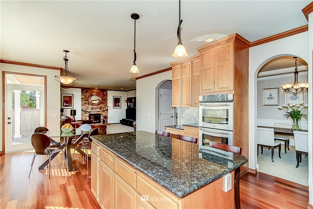 4004 215th Street Southeast Bothell, WA 98021 - Photo 8 of 25 a view of a living room and kitchen
