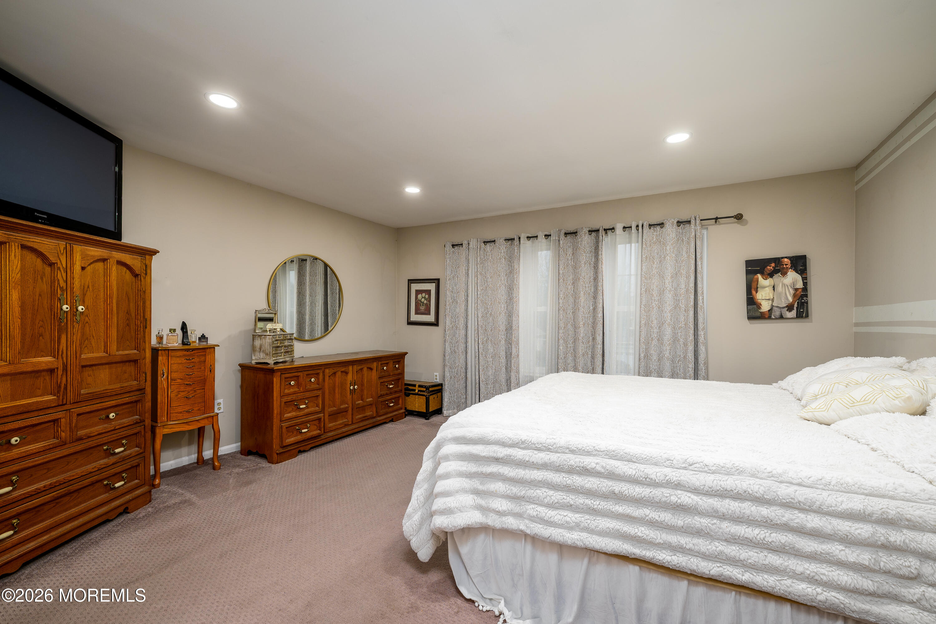 4 Cambridge Drive Howell, NJ 07731 - Photo 22 of 39 a bedroom with a bed and a dresser