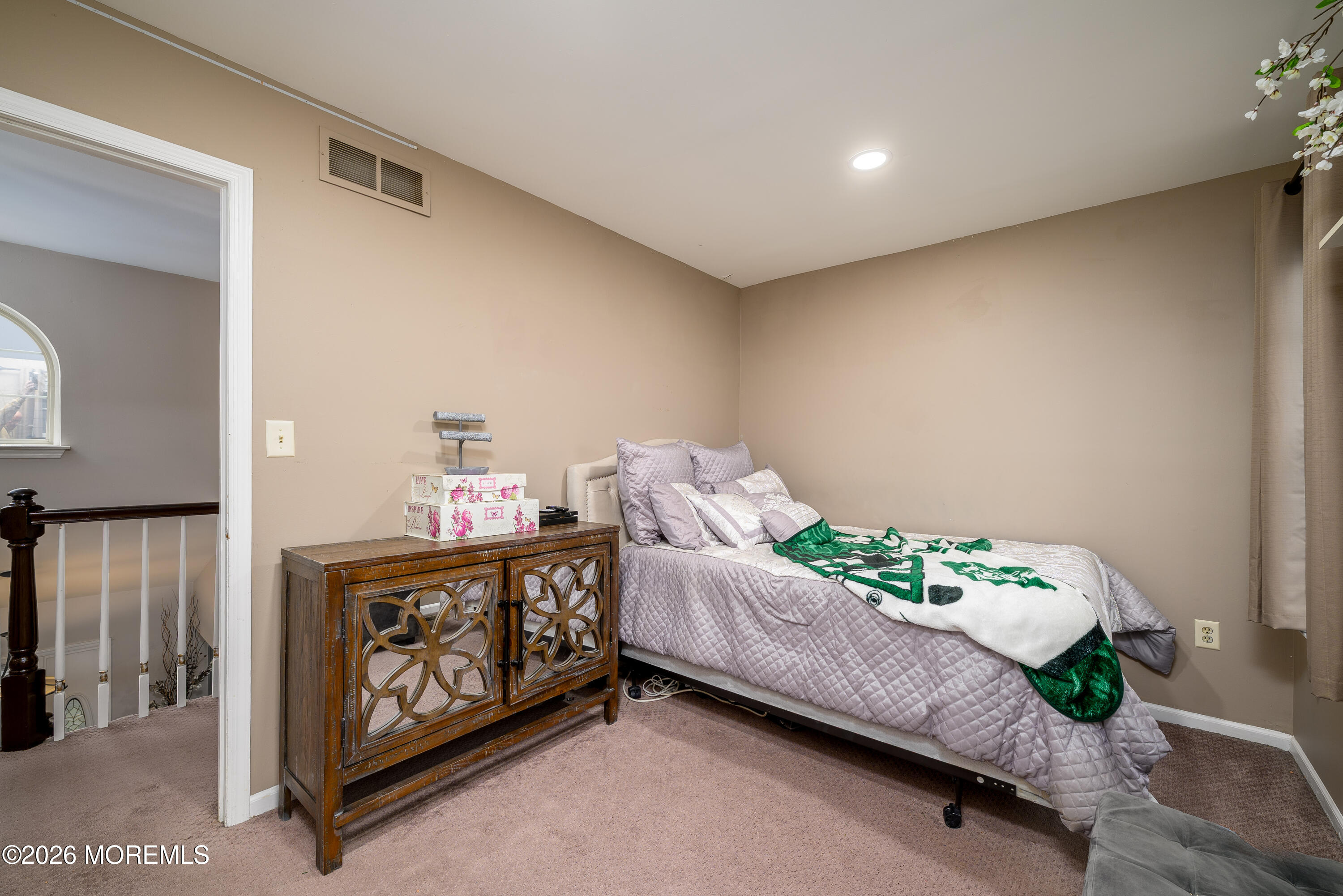 4 Cambridge Drive Howell, NJ 07731 - Photo 26 of 39 a bed room with a bed and a couch