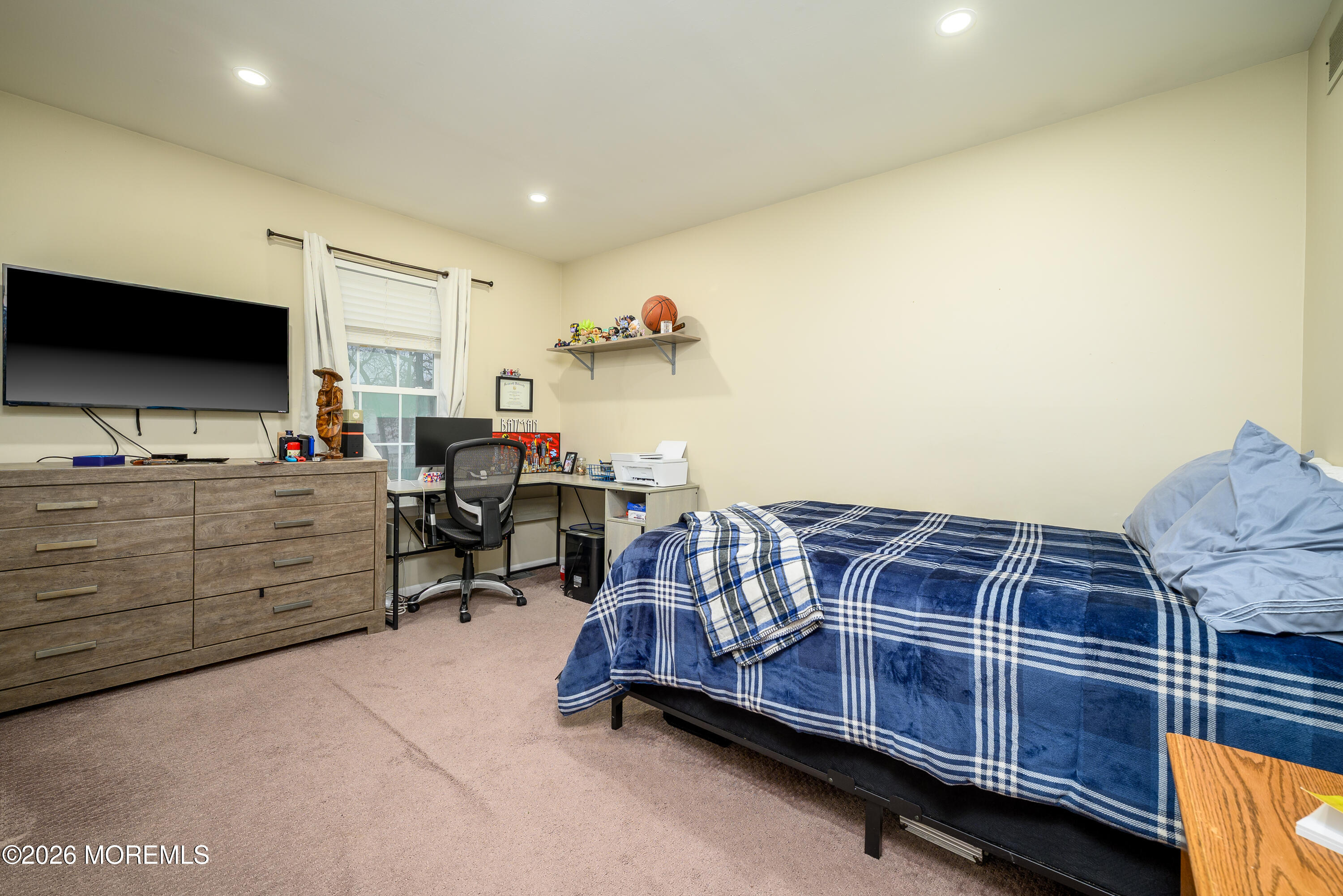 4 Cambridge Drive Howell, NJ 07731 - Photo 30 of 39 a bedroom with furniture and a flat screen tv