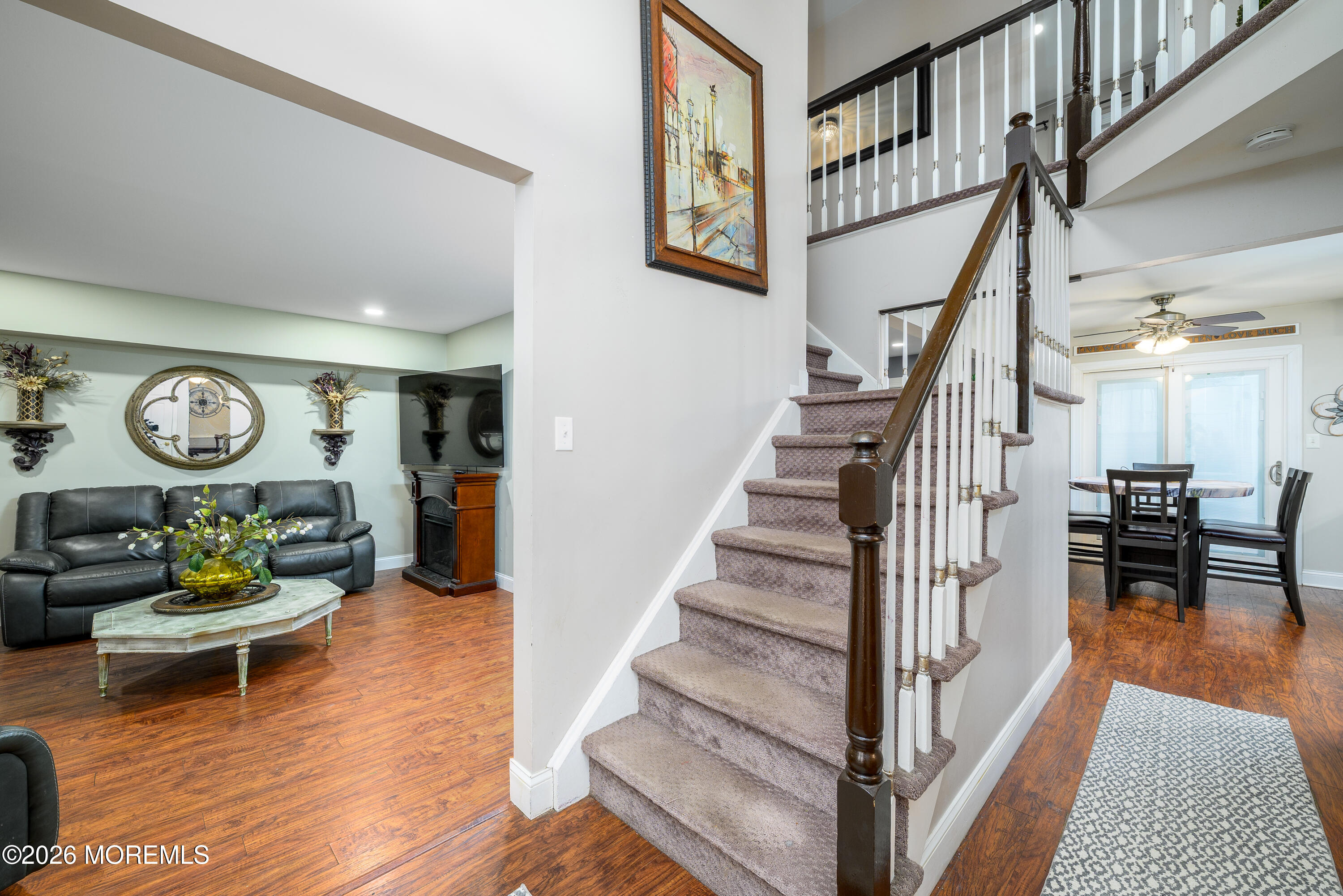 4 Cambridge Drive Howell, NJ 07731 - Photo 6 of 39 a living room with furniture and a table