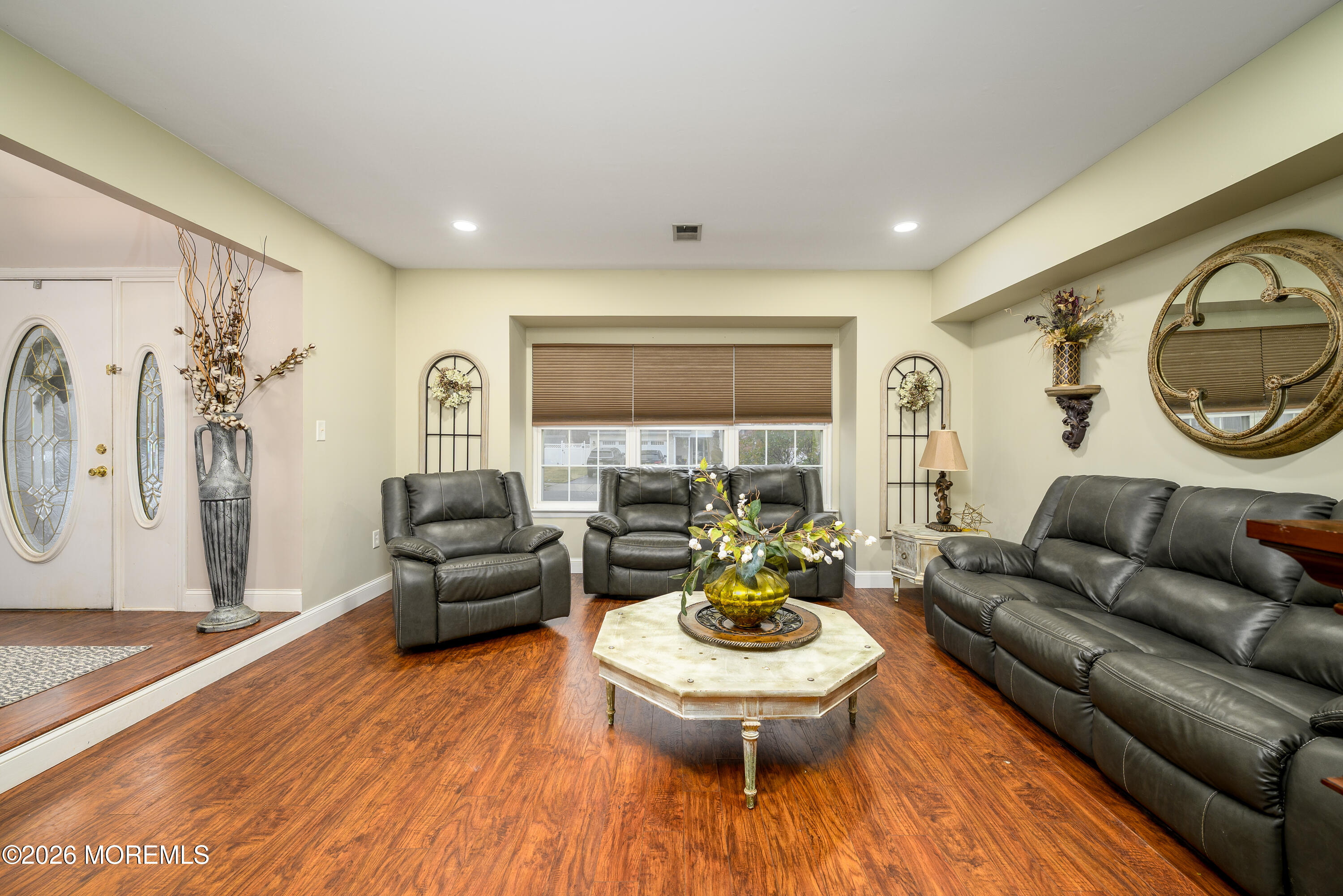 4 Cambridge Drive Howell, NJ 07731 - Photo 7 of 39 a living room with furniture and a large window