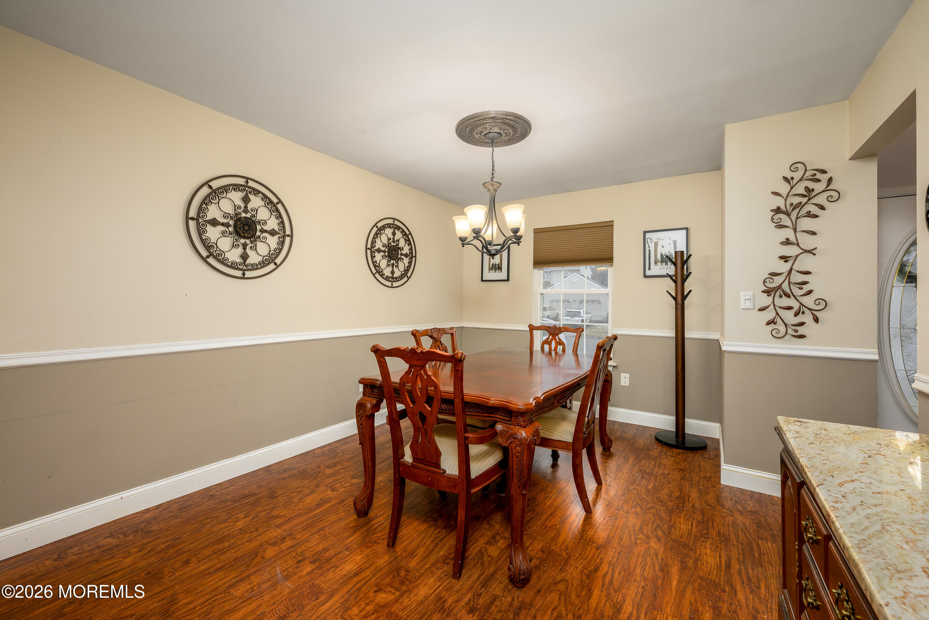 4 Cambridge Drive Howell, NJ 07731 - Photo 10 of 39 a view of a dining room with furniture and wooden floor