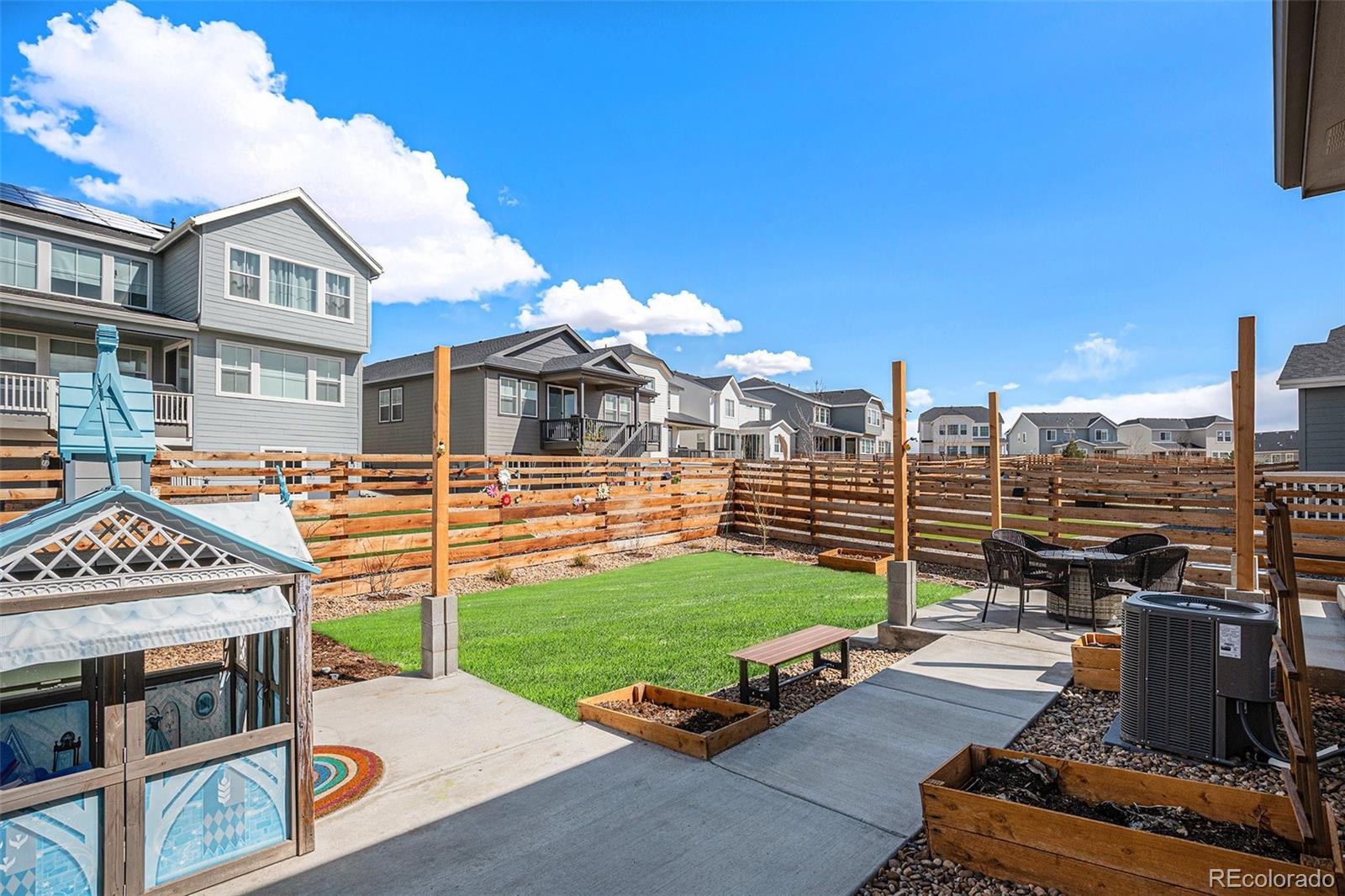 3522 North Buchanan Way Aurora, CO 80019 - Photo 27 of 30 a view of a chairs and table in the terrace