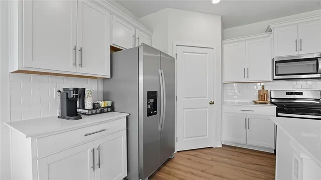 $444,990 | 713 Fallen Leaf Drive, Belton, MO 64012