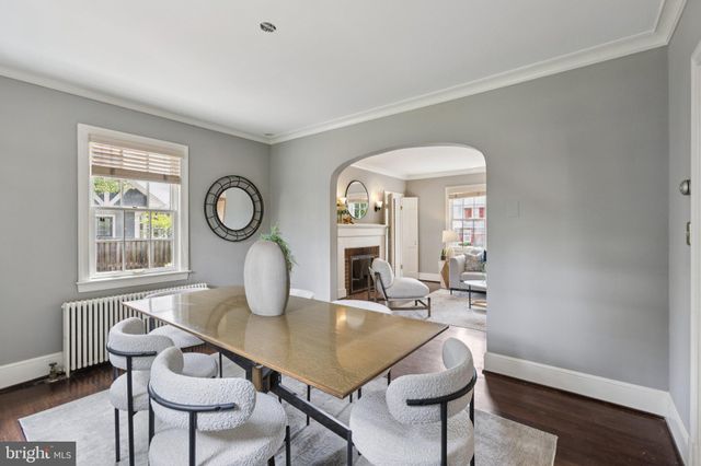 a view of a livingroom with furniture window and wooden floor