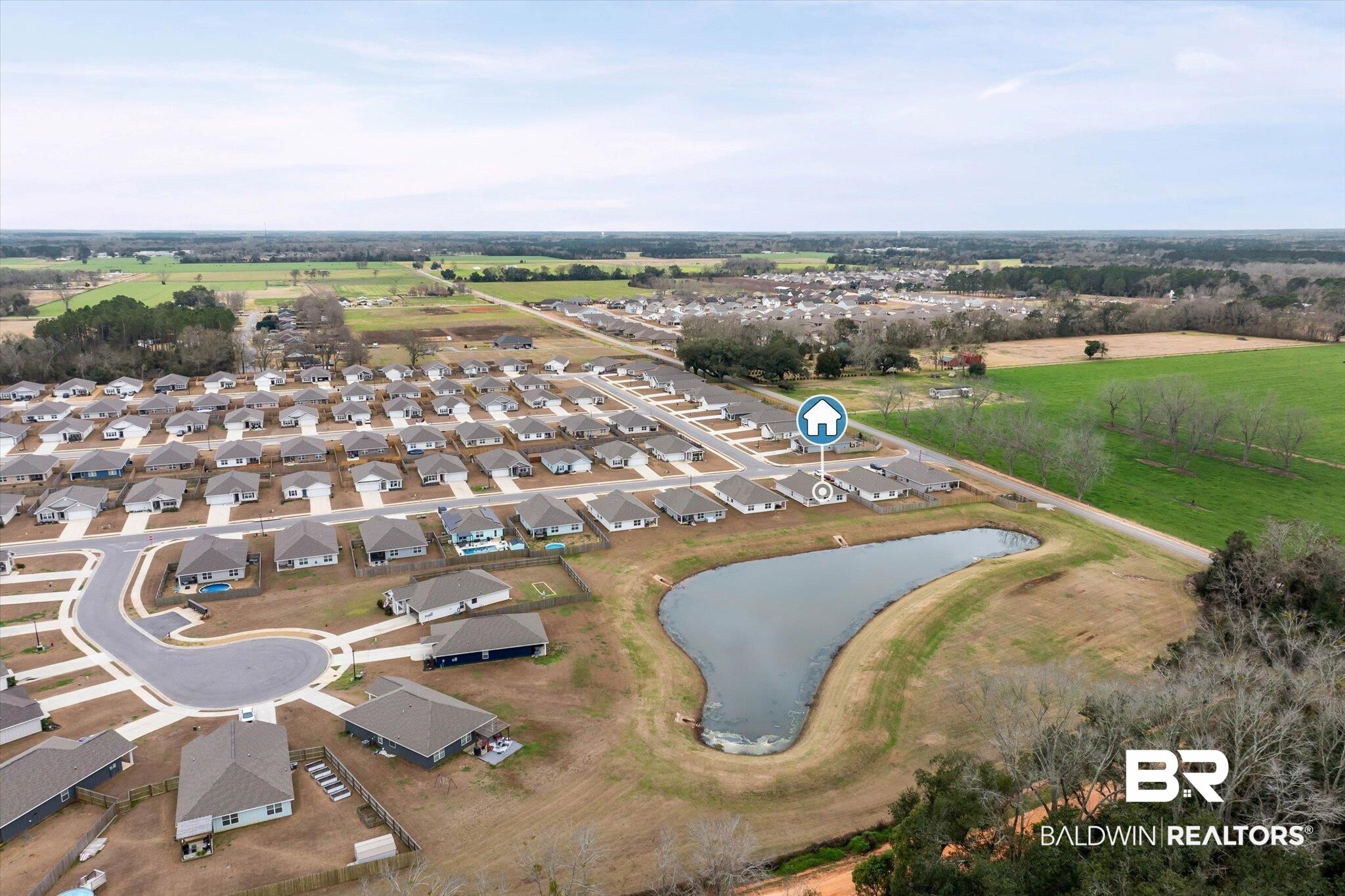 17041 Muse Street Loxley, AL 36551 - Photo 39 of 44 Aerial overview of property's location featuring nearby suburban area and a nearby body of water
