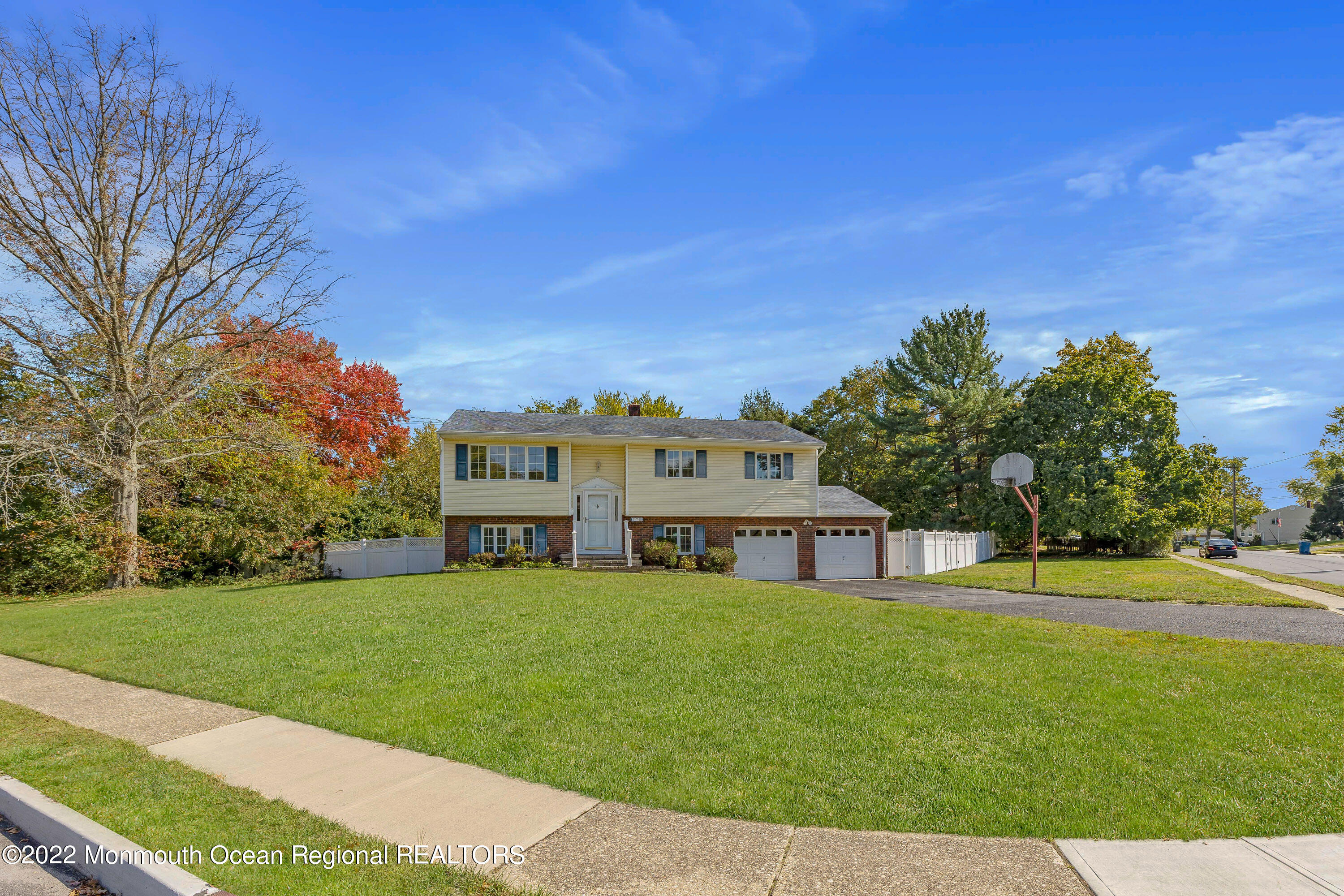 37 Westbrook Road Howell, NJ 07731 - Photo 1 of 39 a view of a house with a big yard and large trees