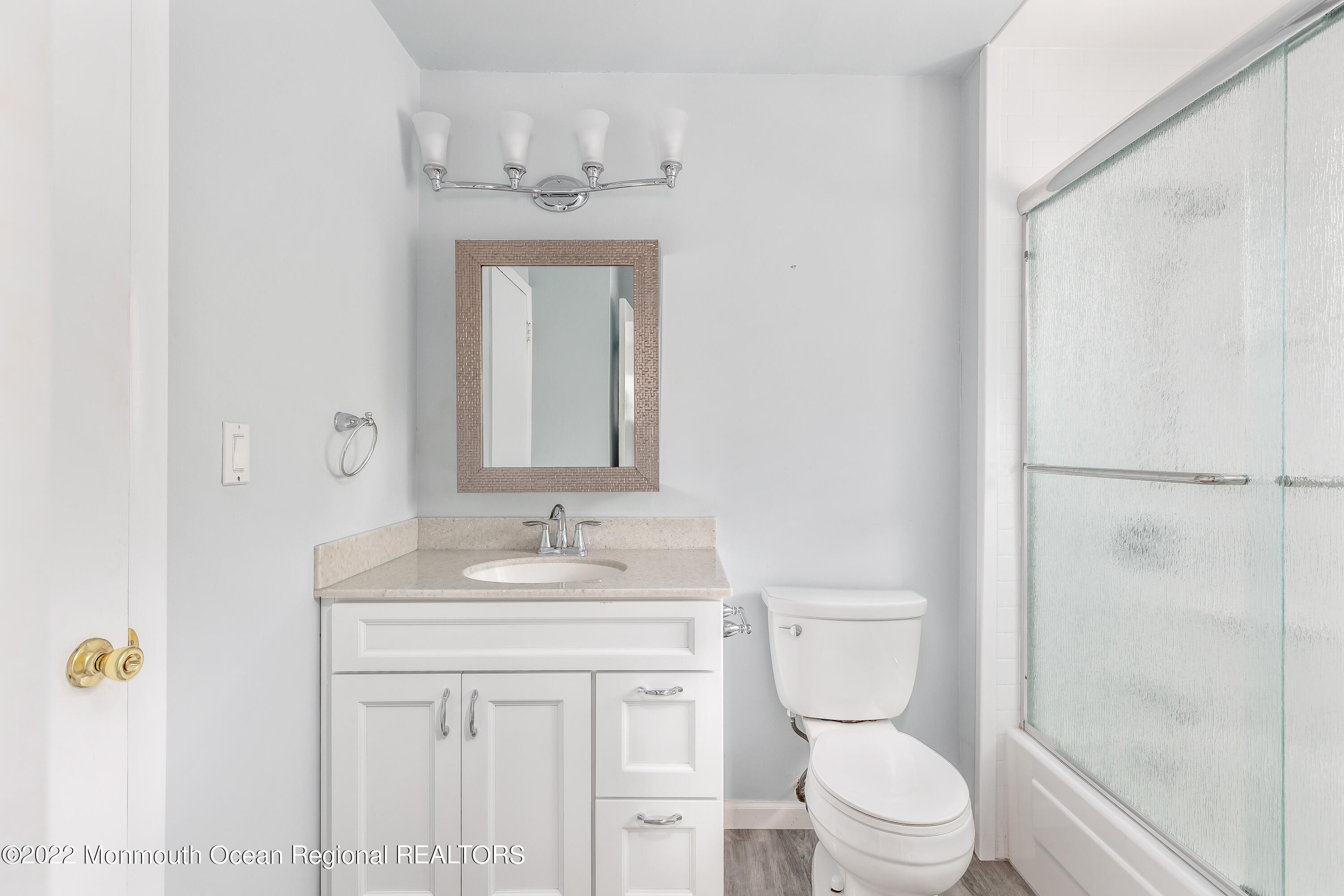37 Westbrook Road Howell, NJ 07731 - Photo 17 of 39 a bathroom with a toilet a sink and a mirror