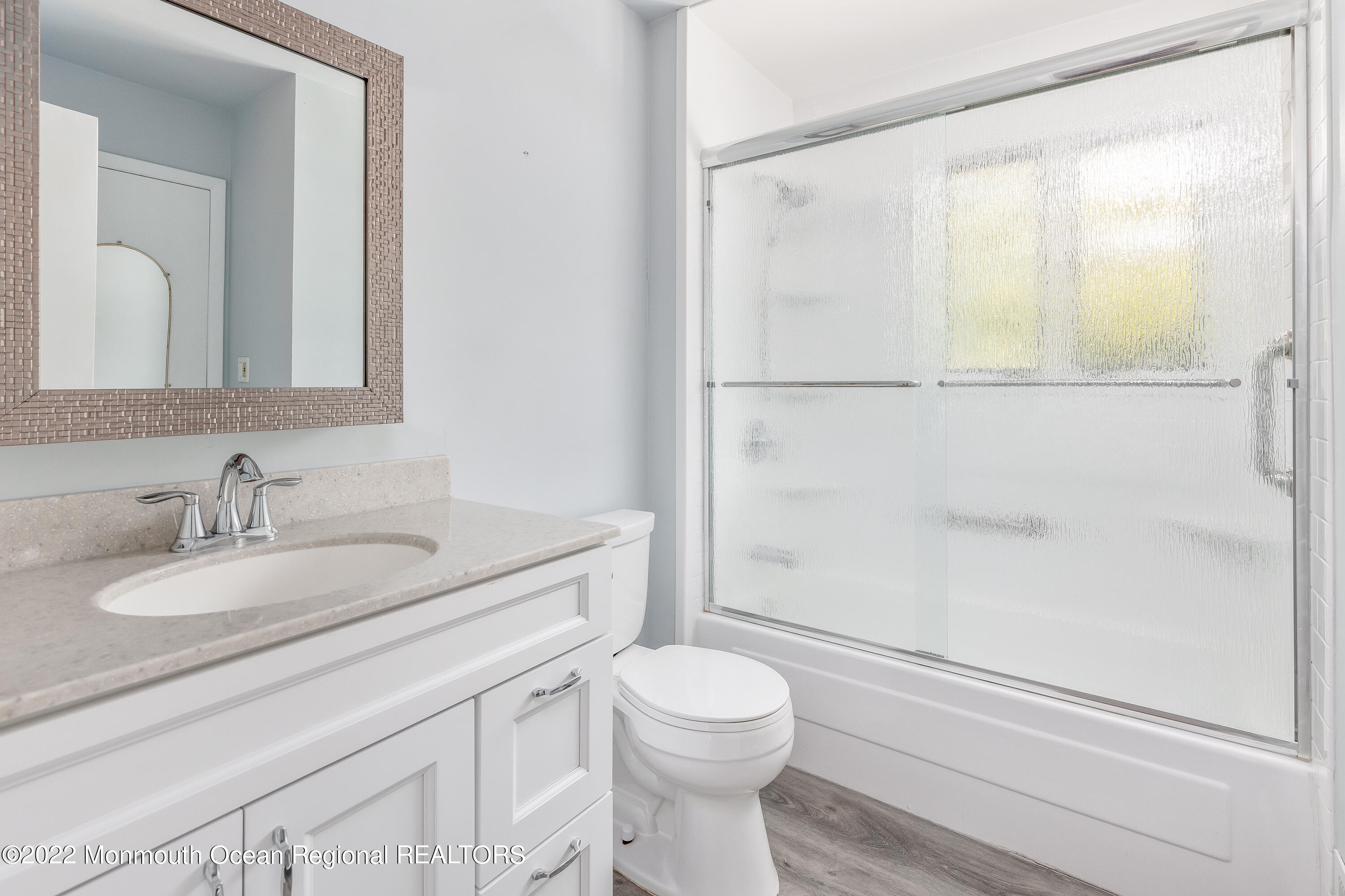 37 Westbrook Road Howell, NJ 07731 - Photo 18 of 39 a bathroom with a granite countertop sink toilet and shower
