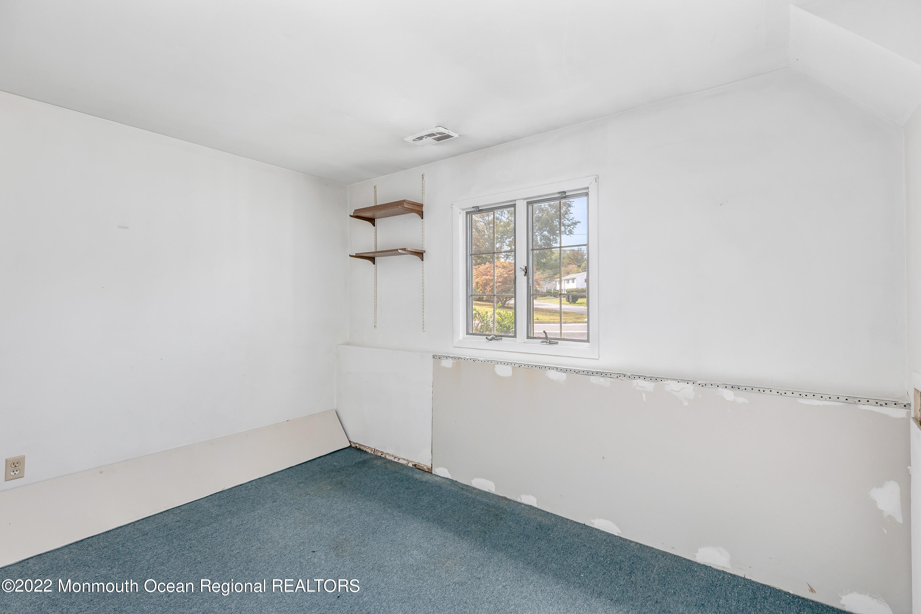 37 Westbrook Road Howell, NJ 07731 - Photo 25 of 39 a view of an empty room with a window