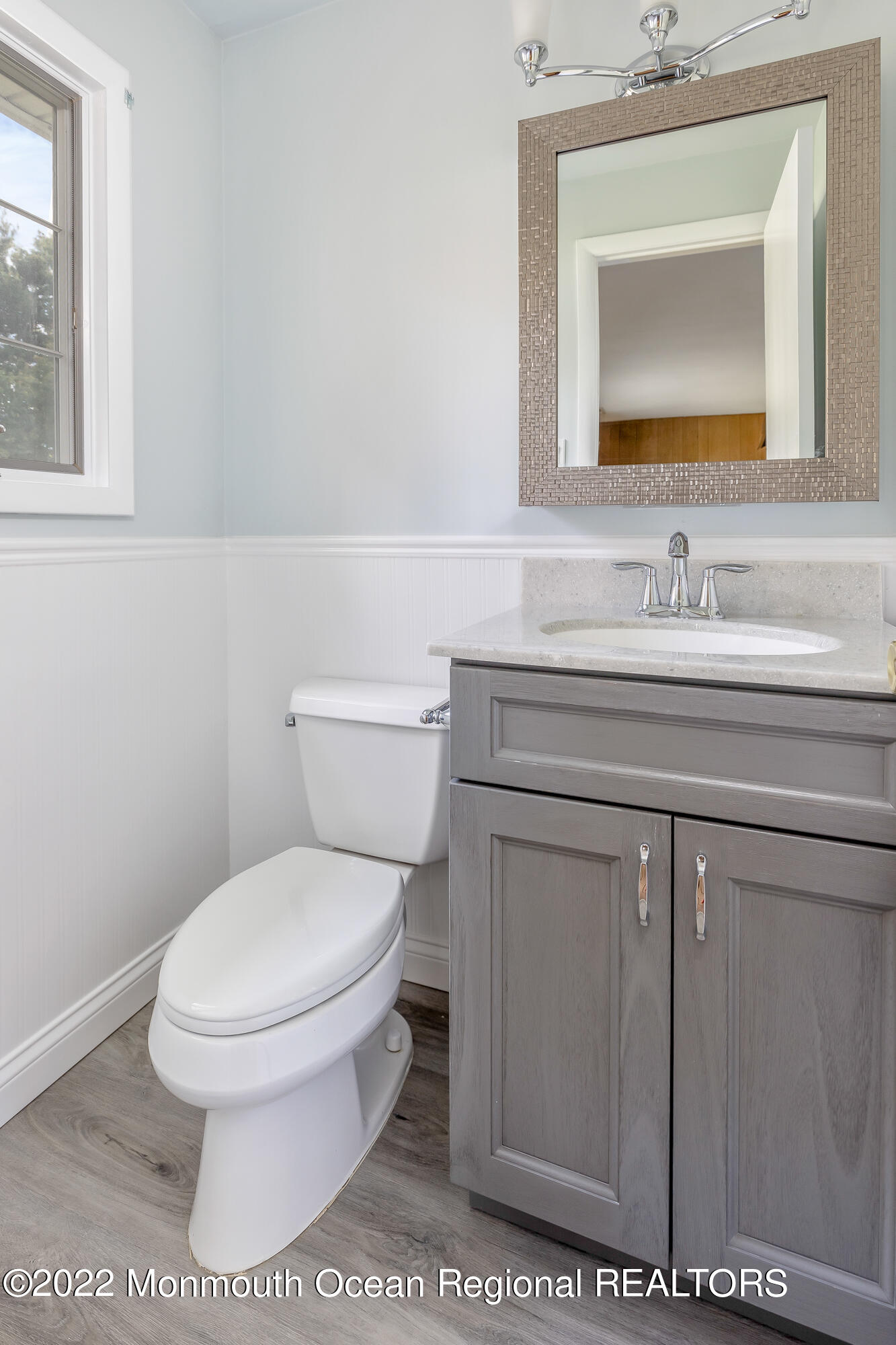 37 Westbrook Road Howell, NJ 07731 - Photo 27 of 39 a bathroom with a toilet a sink and mirror