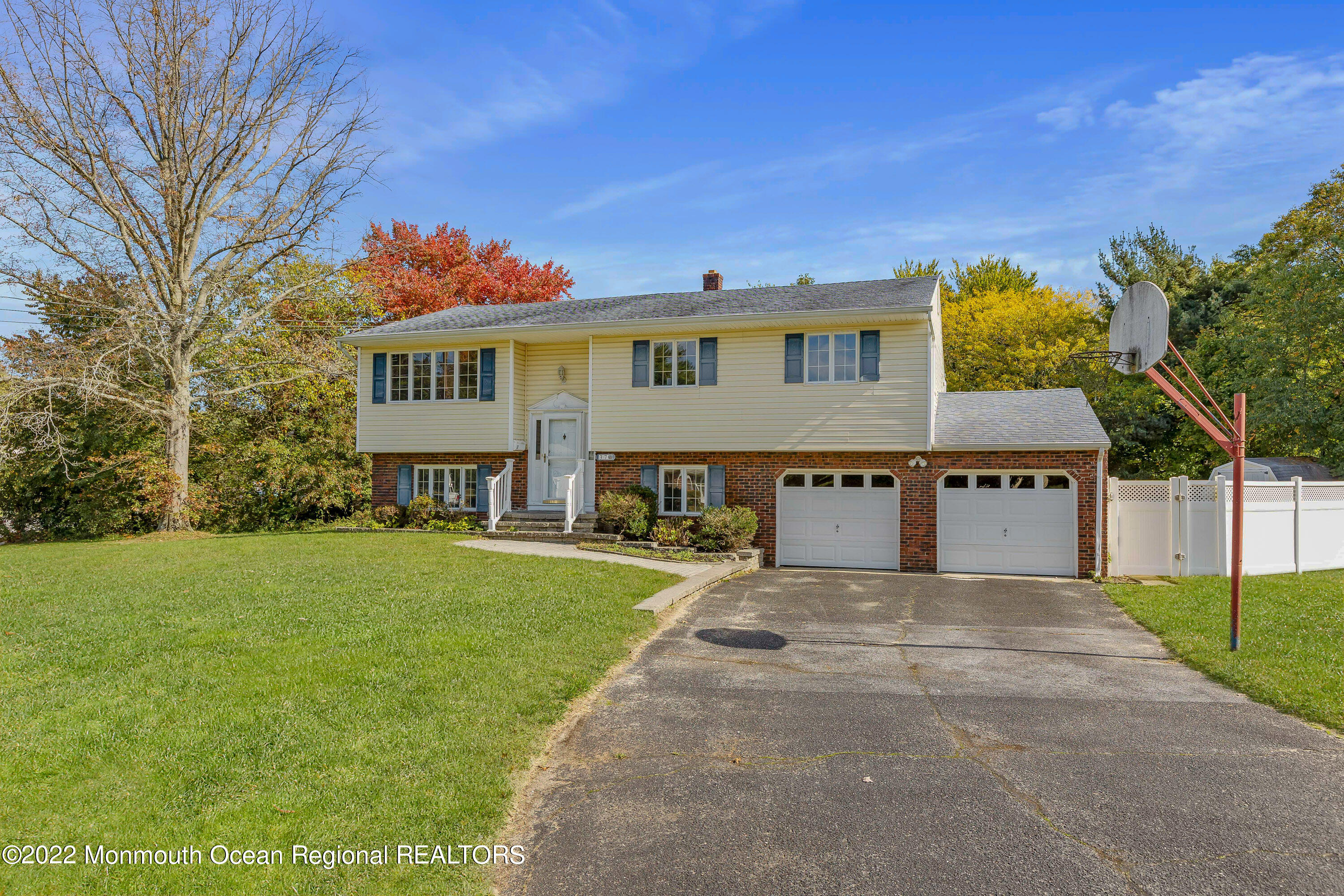 37 Westbrook Road Howell, NJ 07731 - Photo 3 of 39 a view of a house with a yard and potted plants